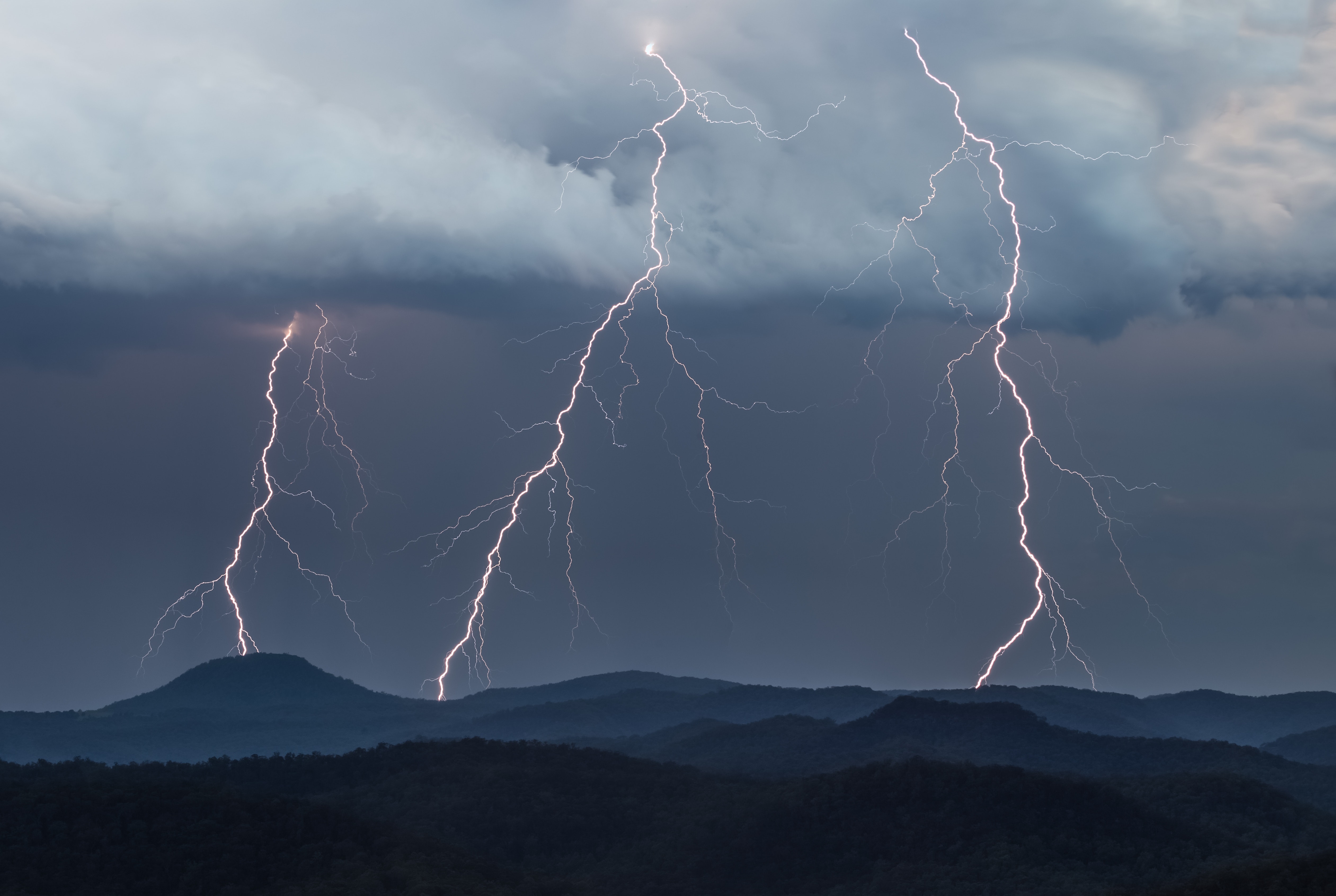 Thunderstorm with lightning over mountains HD Wallpaper