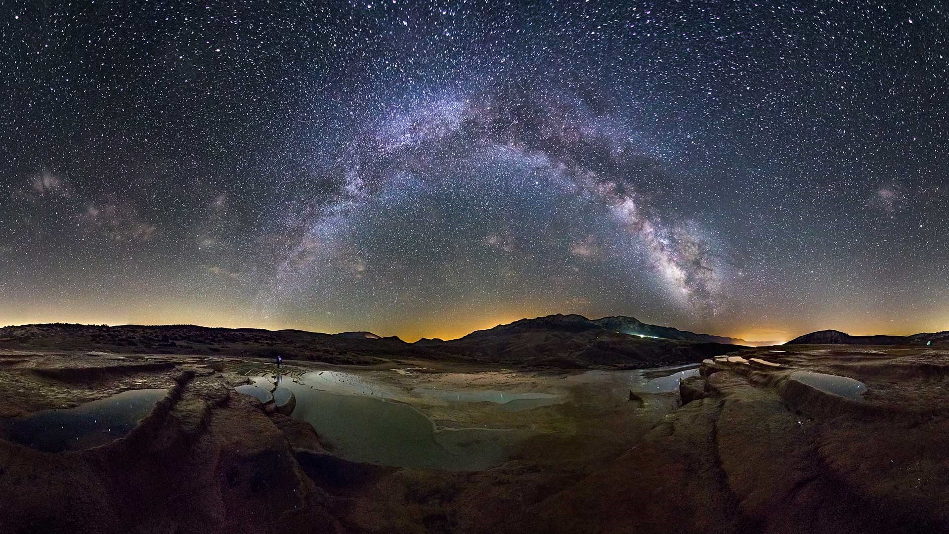 Milky Way over a rocky landscape with pools HD Wallpaper
