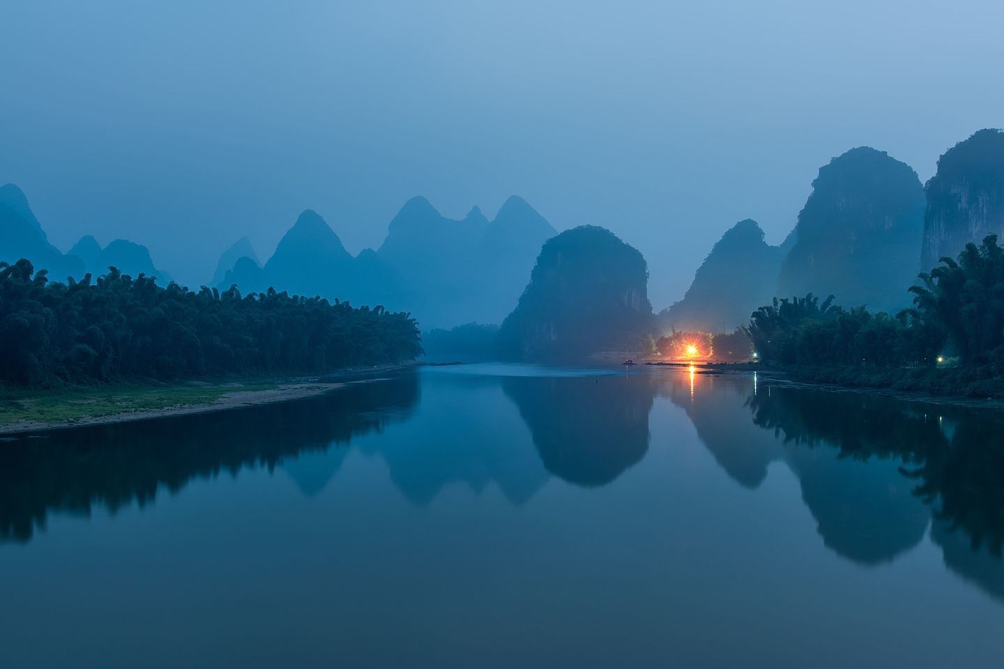 Misty mountains and river reflection at dusk HD Wallpaper