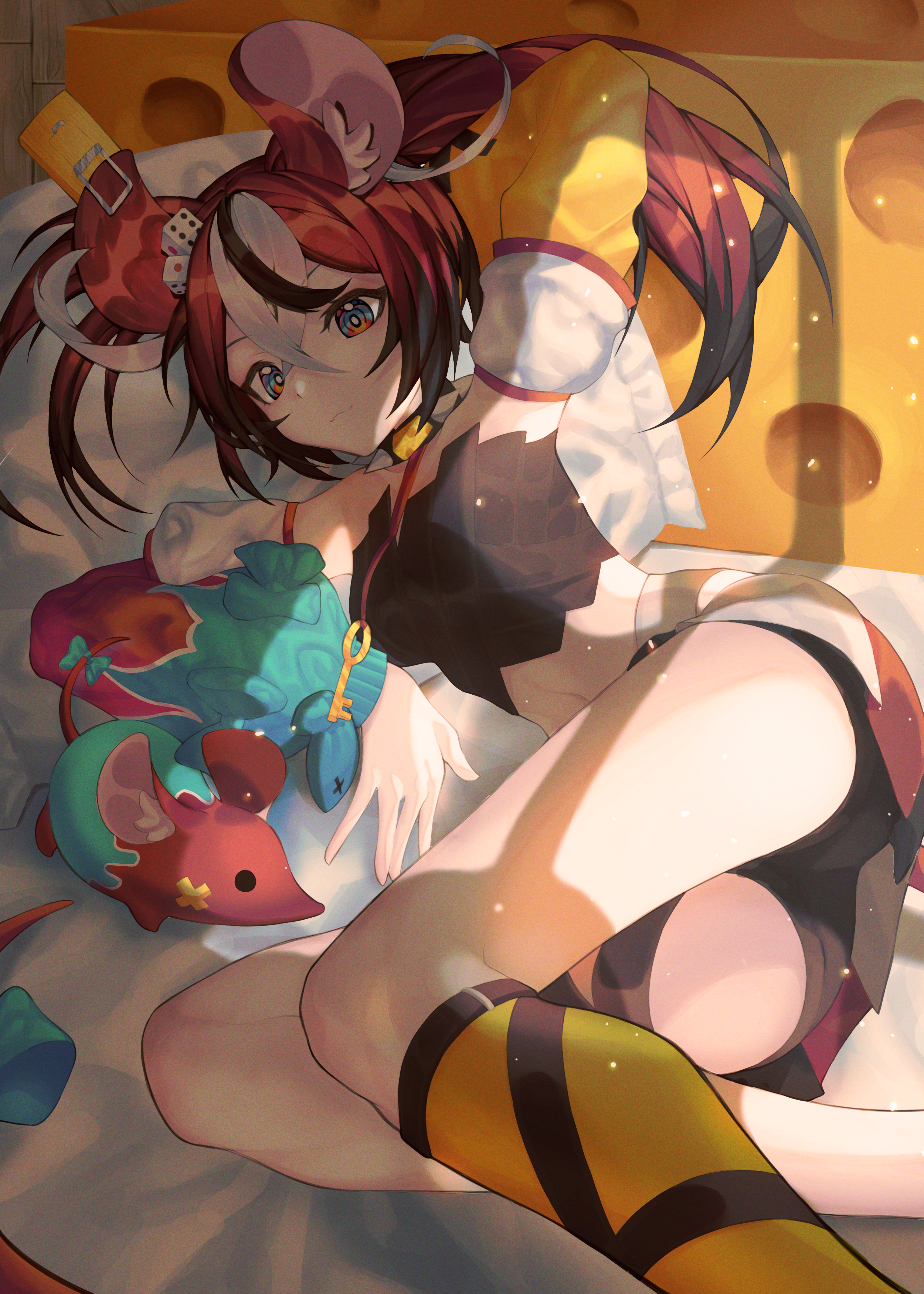 Hakos Baelz lying on a cheese-like surface HD Phone Wallpaper