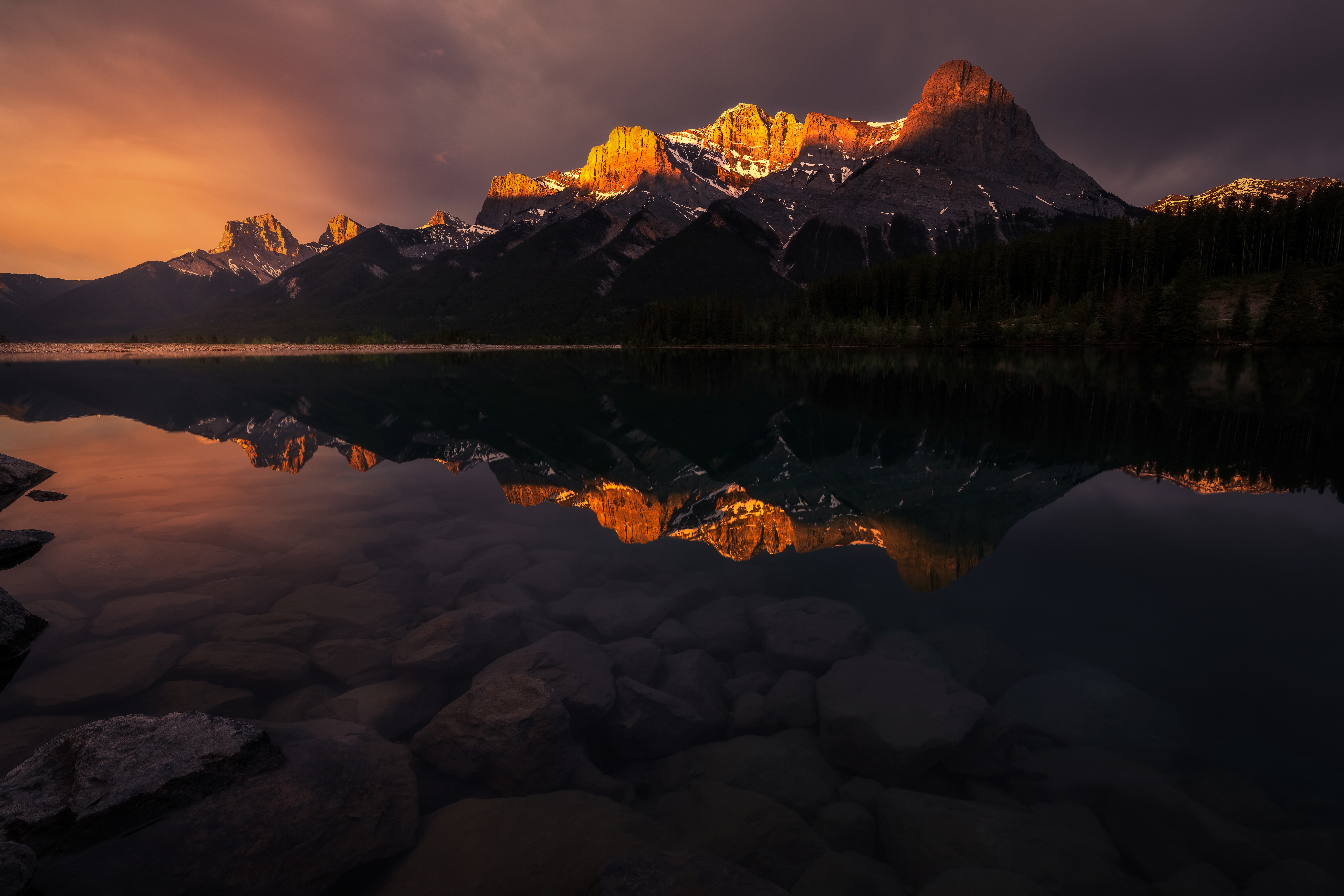 Sunset over the Rocky Mountains reflected in a lake HD Wallpaper