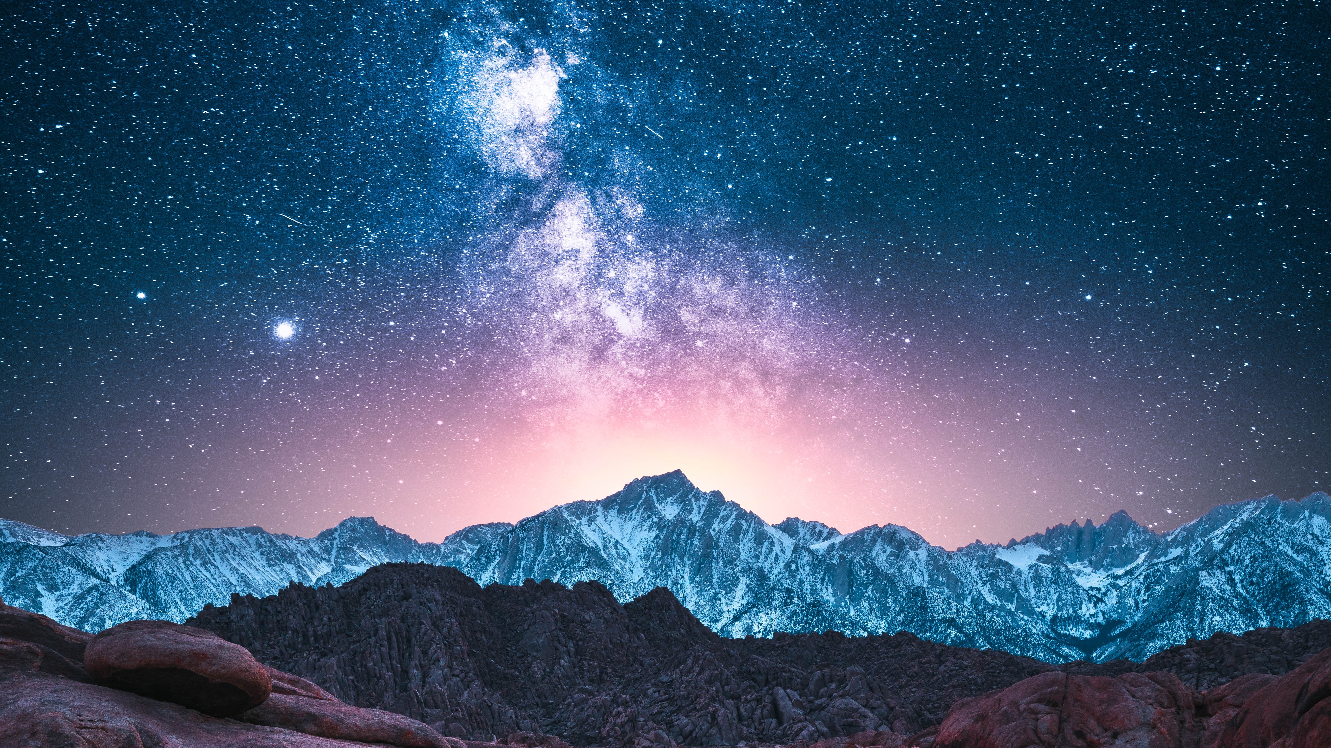 4K Milky Way over snow-capped mountains at sunset HD Wallpaper
