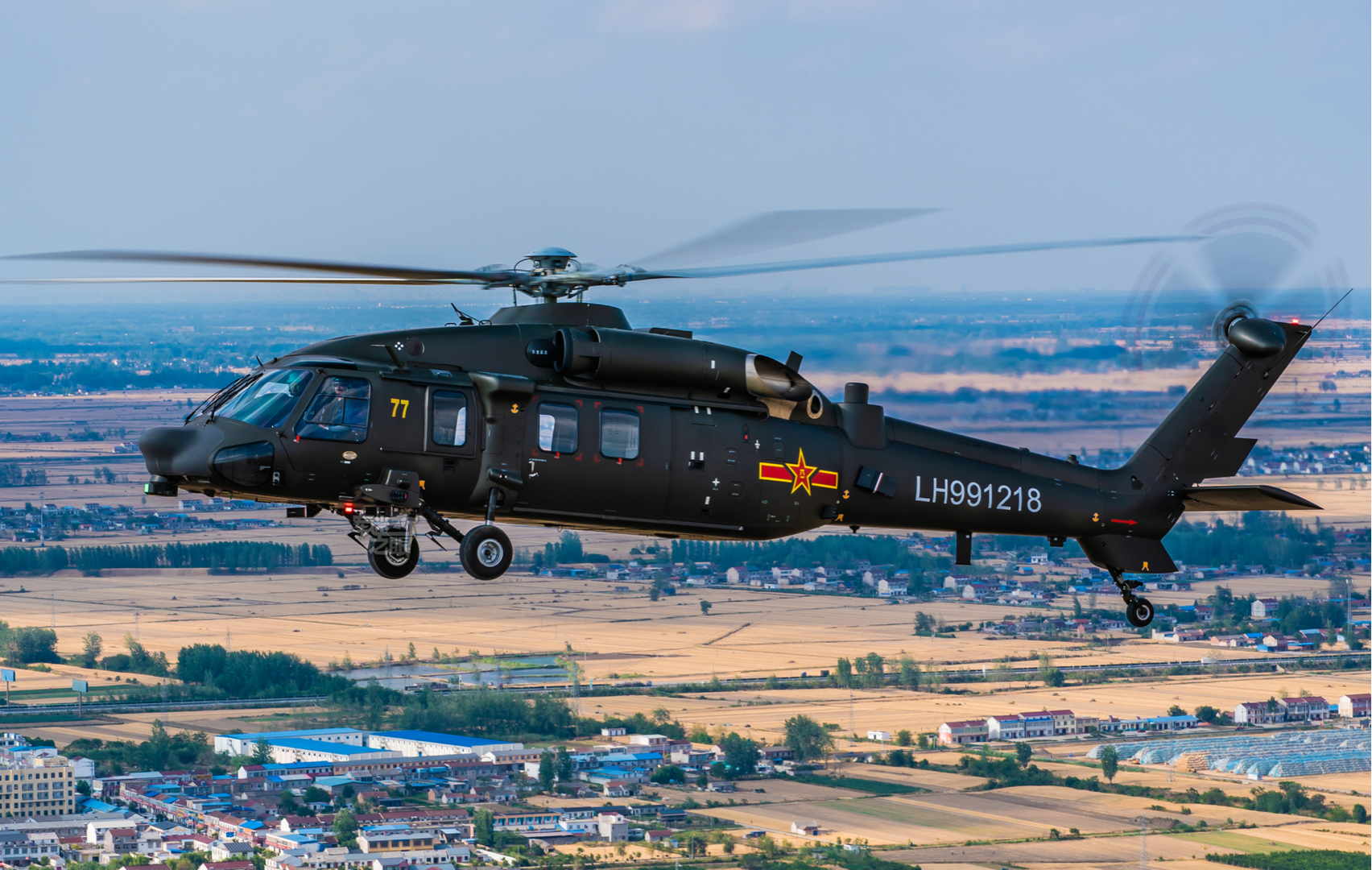 Chinese Z-20 military helicopter in flight HD Wallpaper