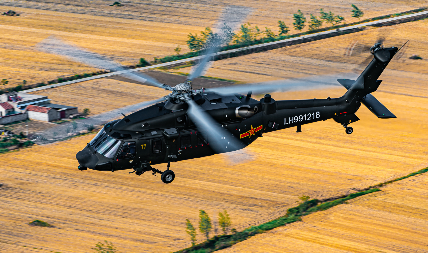 Chinese Z-20 helicopter flying over farmland HD Wallpaper
