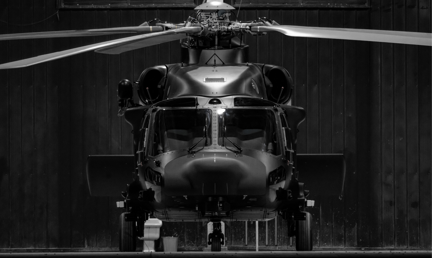 Monochrome Z-20 helicopter in a hangar HD Wallpaper