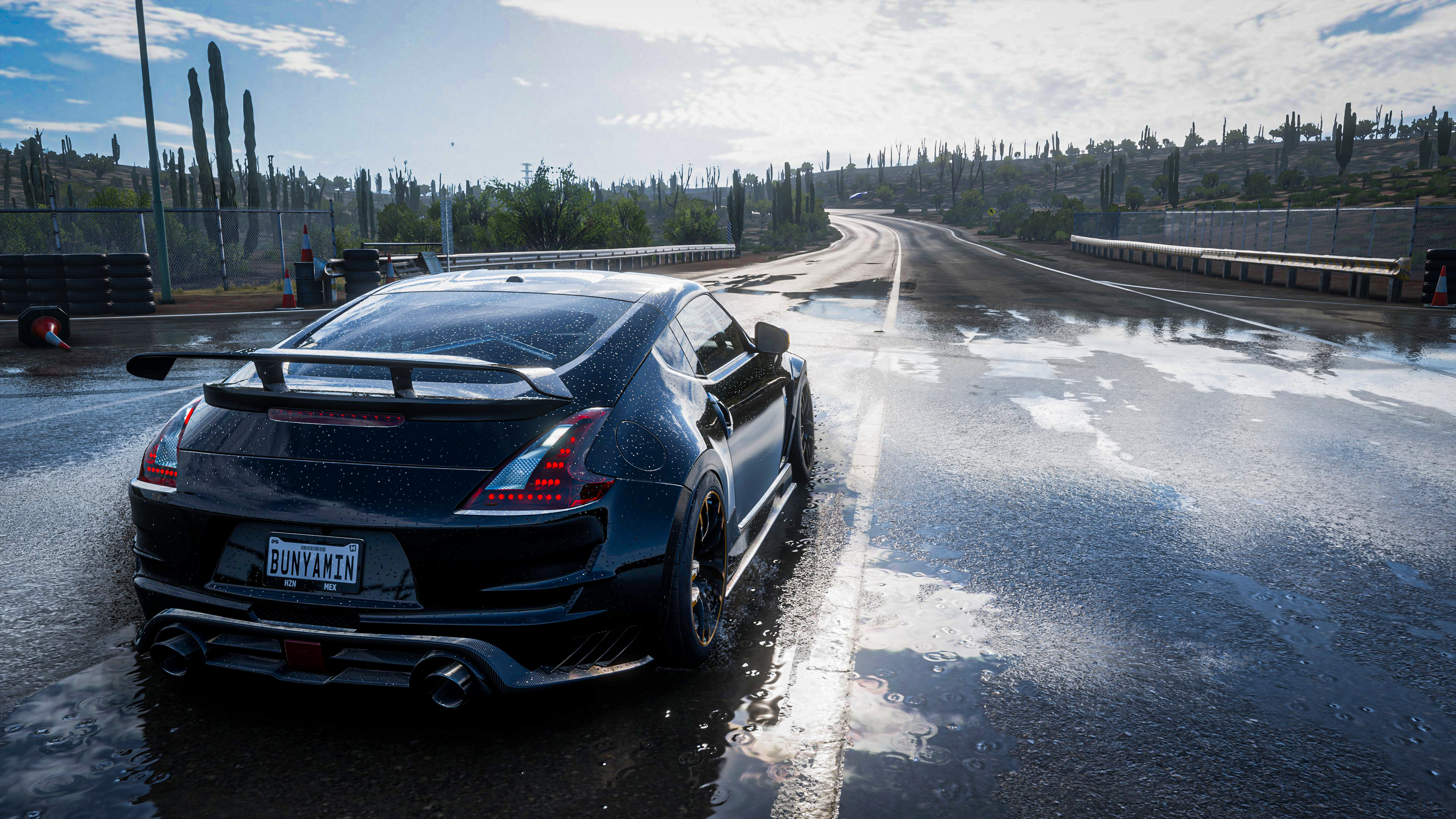 4K Nissan 370Z on a wet road in Forza Horizon 5 HD Wallpaper