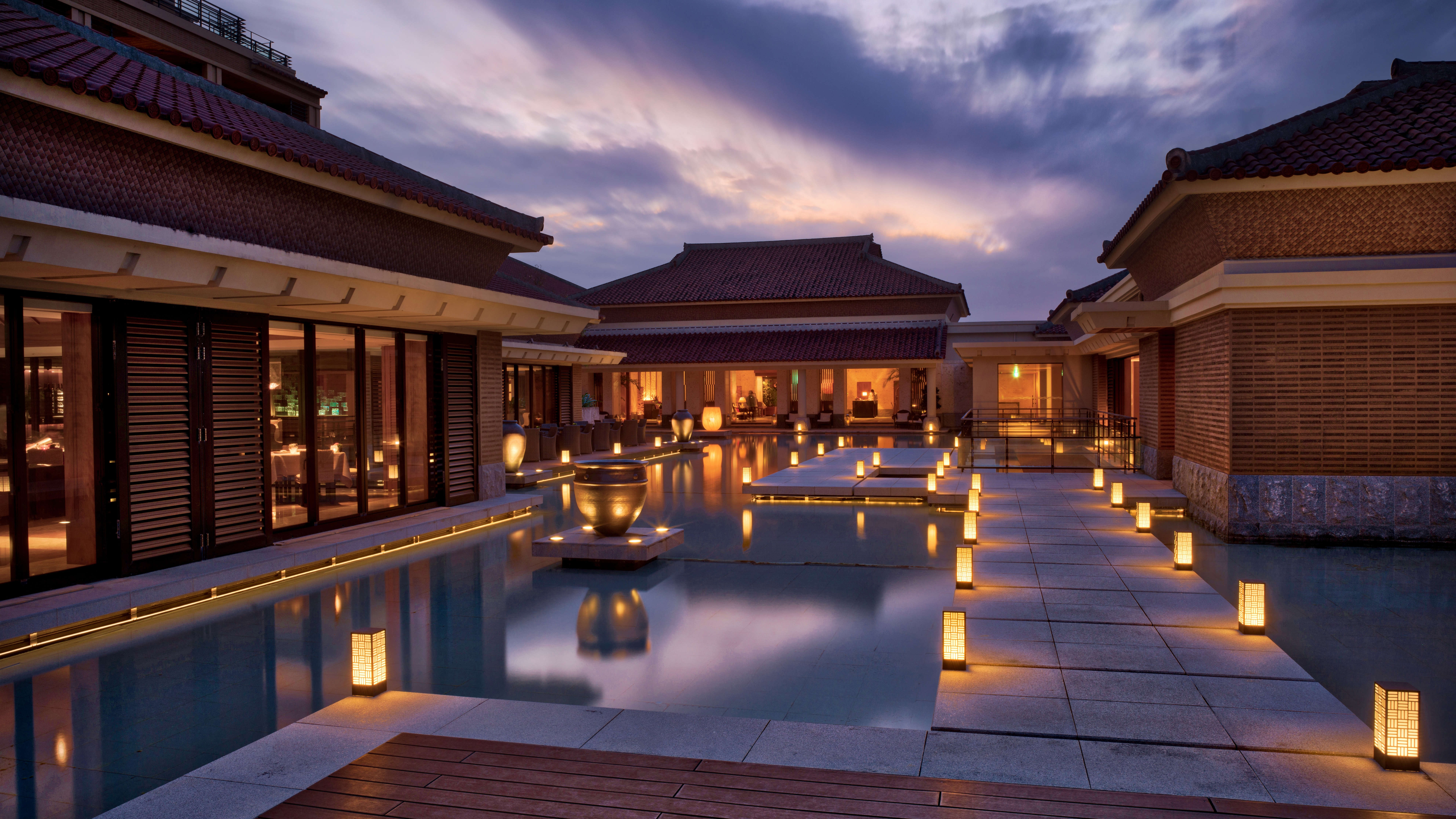 Asian architecture with water and lanterns at dusk HD Wallpaper