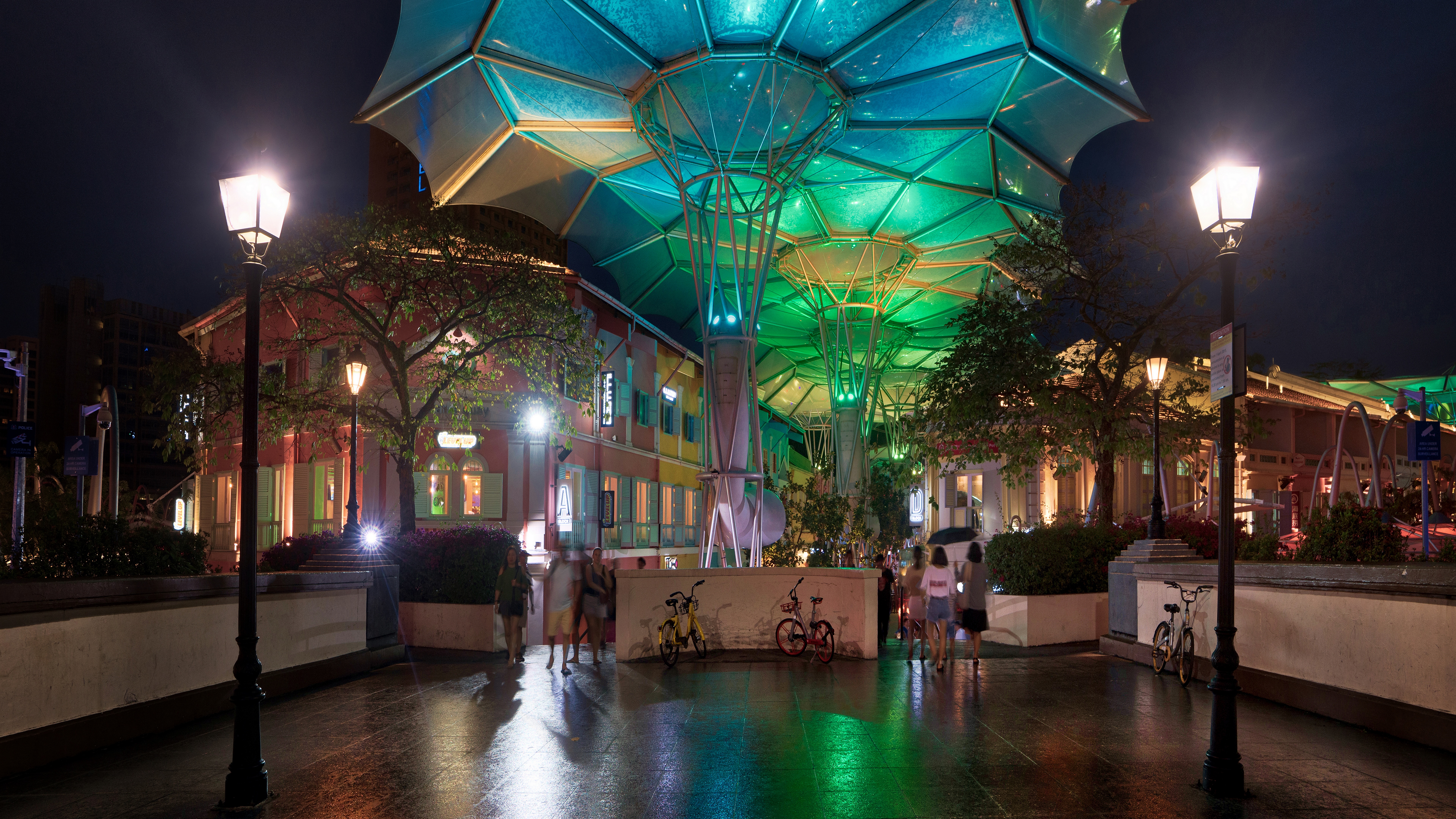 Singapore street at night with colorful lights and people HD Wallpaper