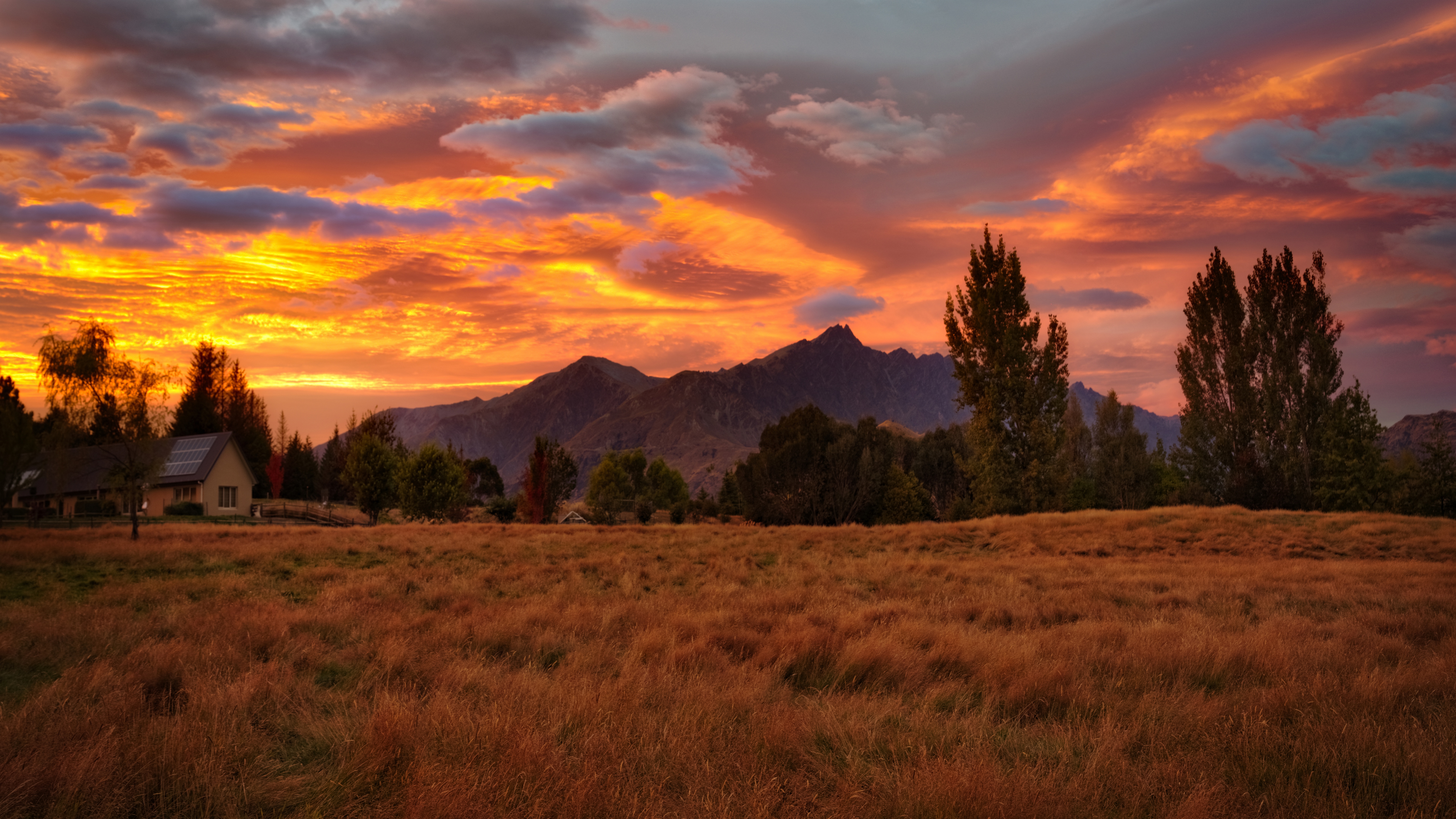 4K Trey Ratcliff sunset over mountains and house HD Wallpaper