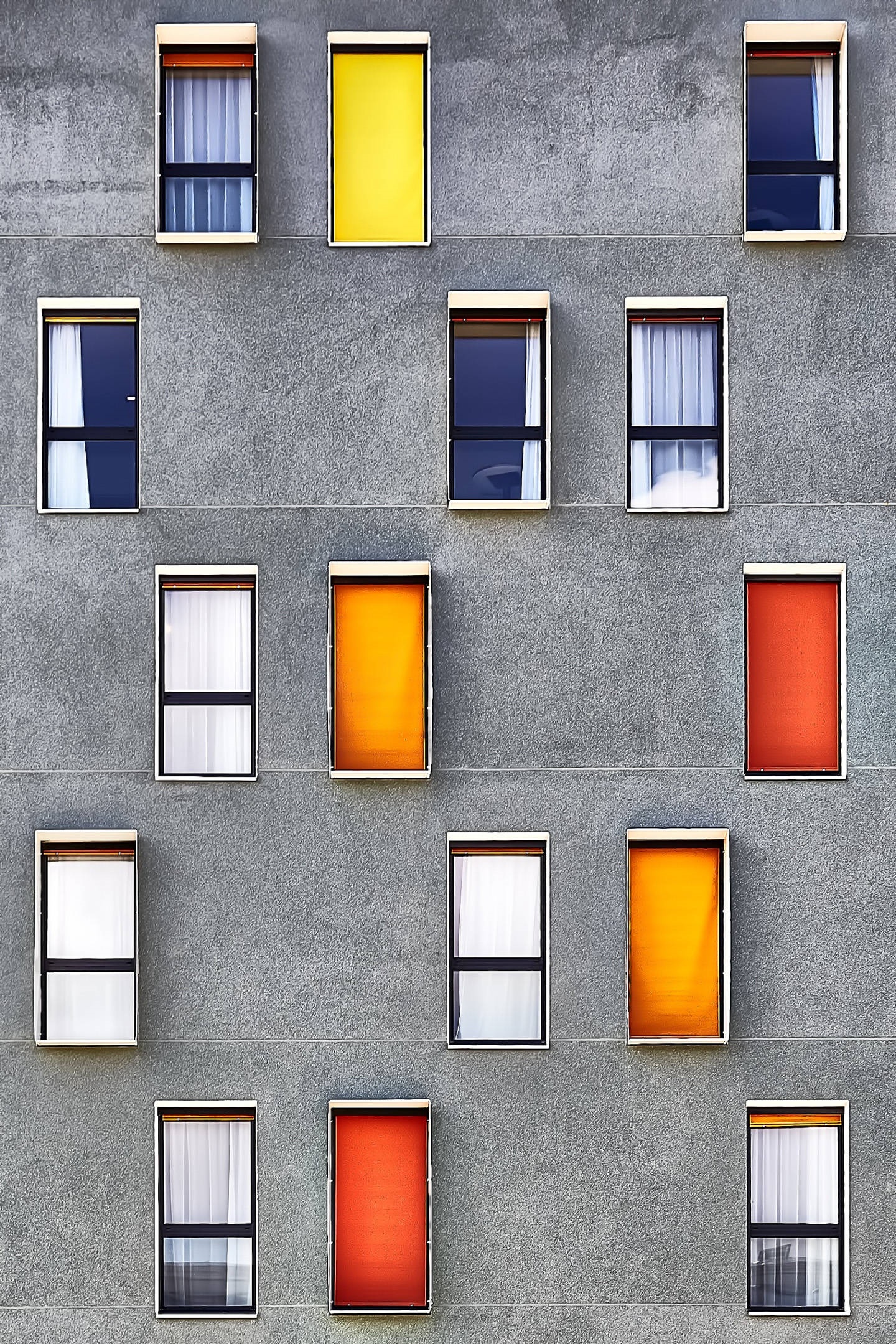 Colorful windows on a concrete building facade HD Phone Wallpaper