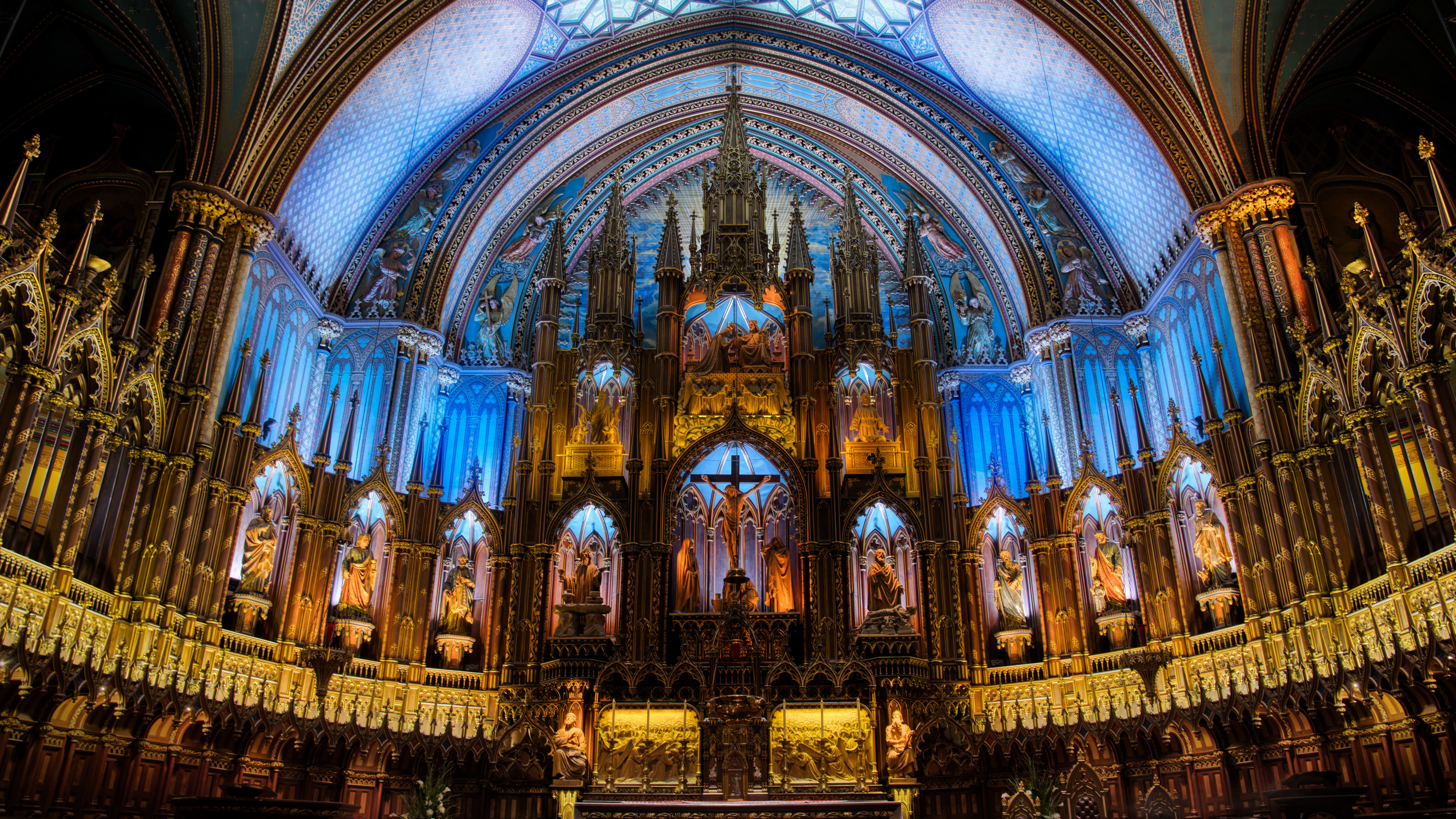Notre-Dame Basilica interior with blue and gold lighting HD Wallpaper
