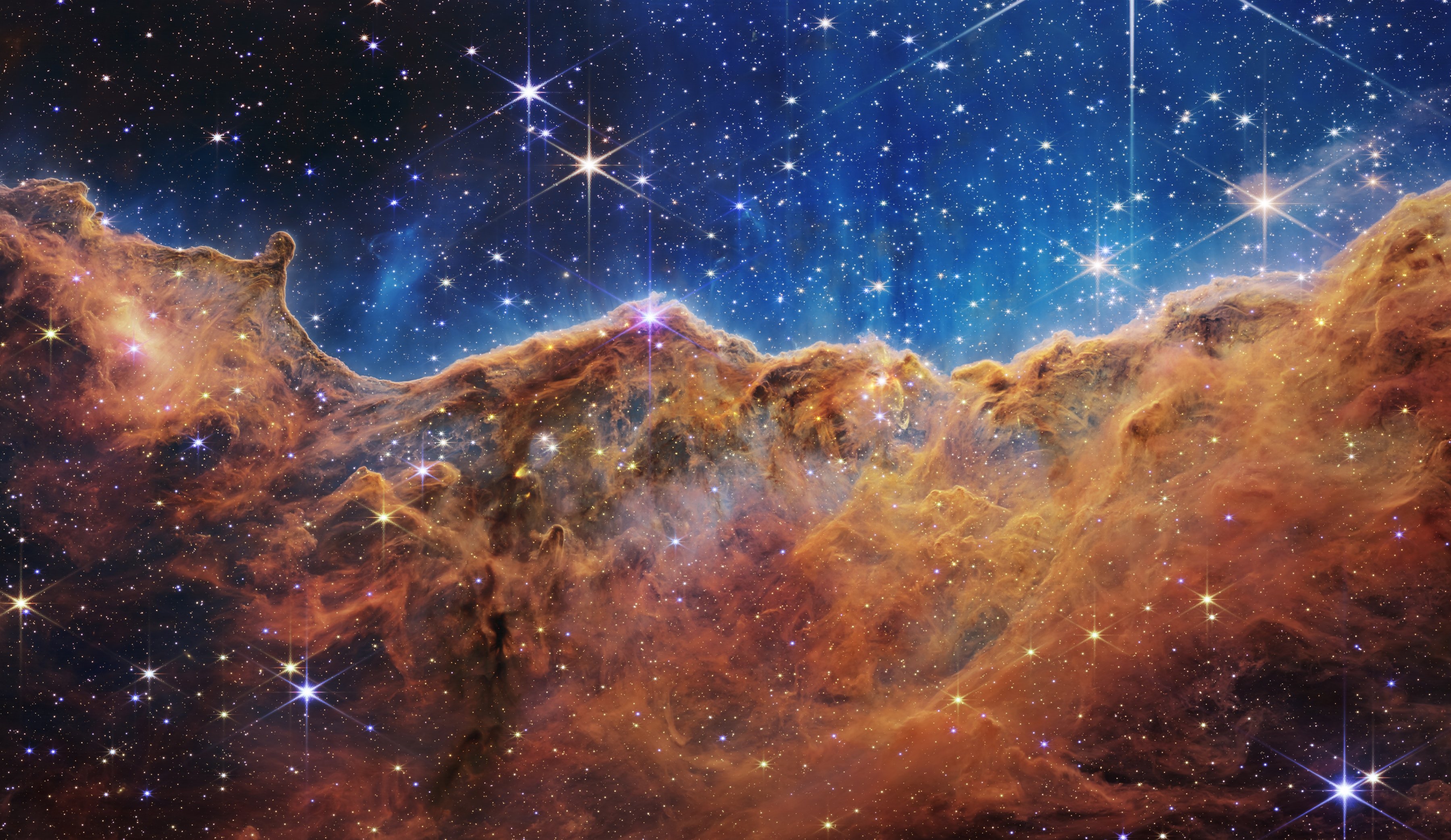 Carina Nebula: James Webb Space Telescope's Infrared View HD Wallpaper