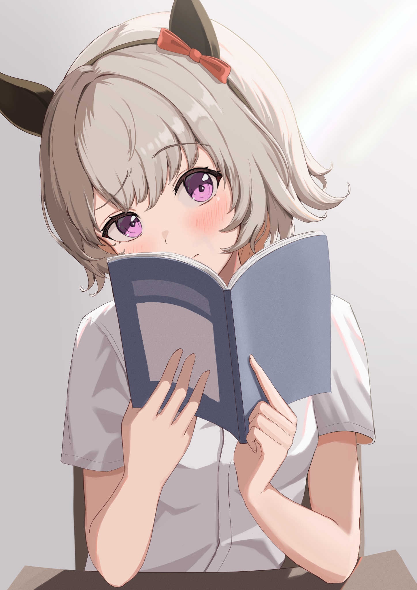 Curren Chan reading a book with horse ears HD Phone Wallpaper