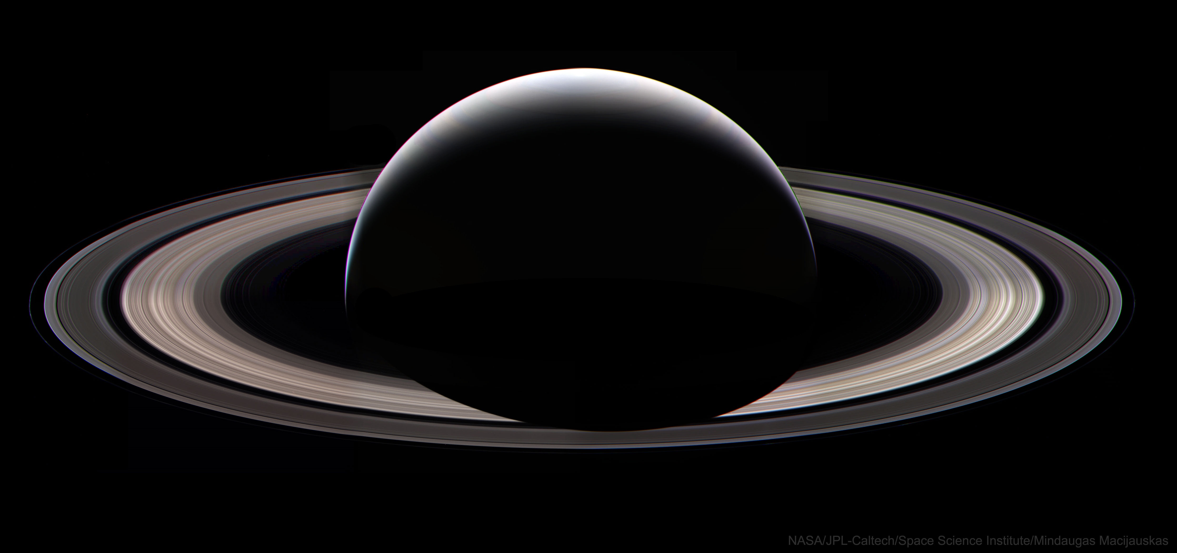Saturn and its rings from space HD Wallpaper