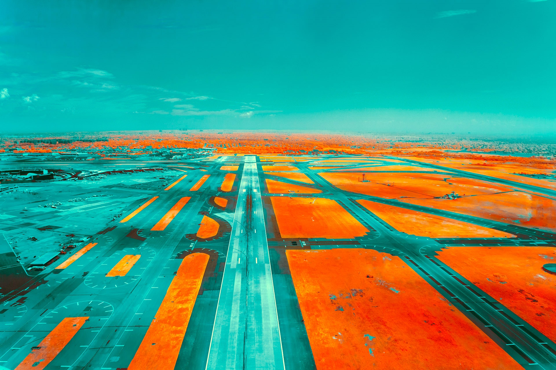 Futuristic abstract airport runway with orange and teal colors HD Wallpaper