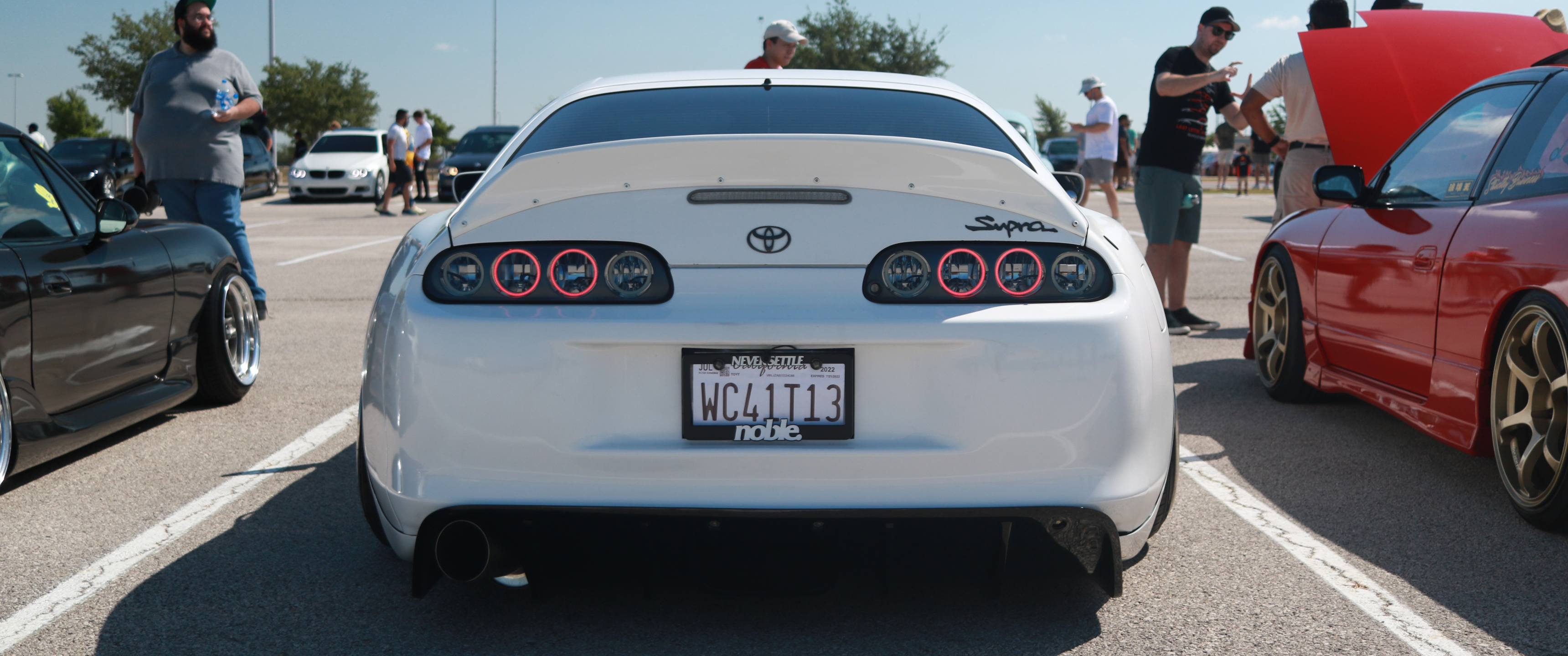 Toyota Supra MK4 at a car show HD Wallpaper