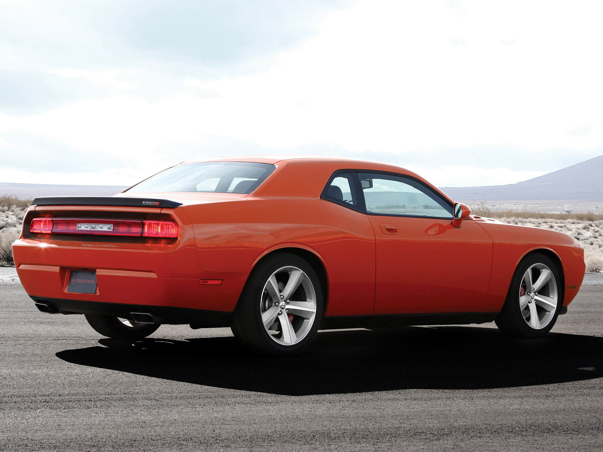 2008 Dodge Challenger SRT8 parked on asphalt HD Wallpaper