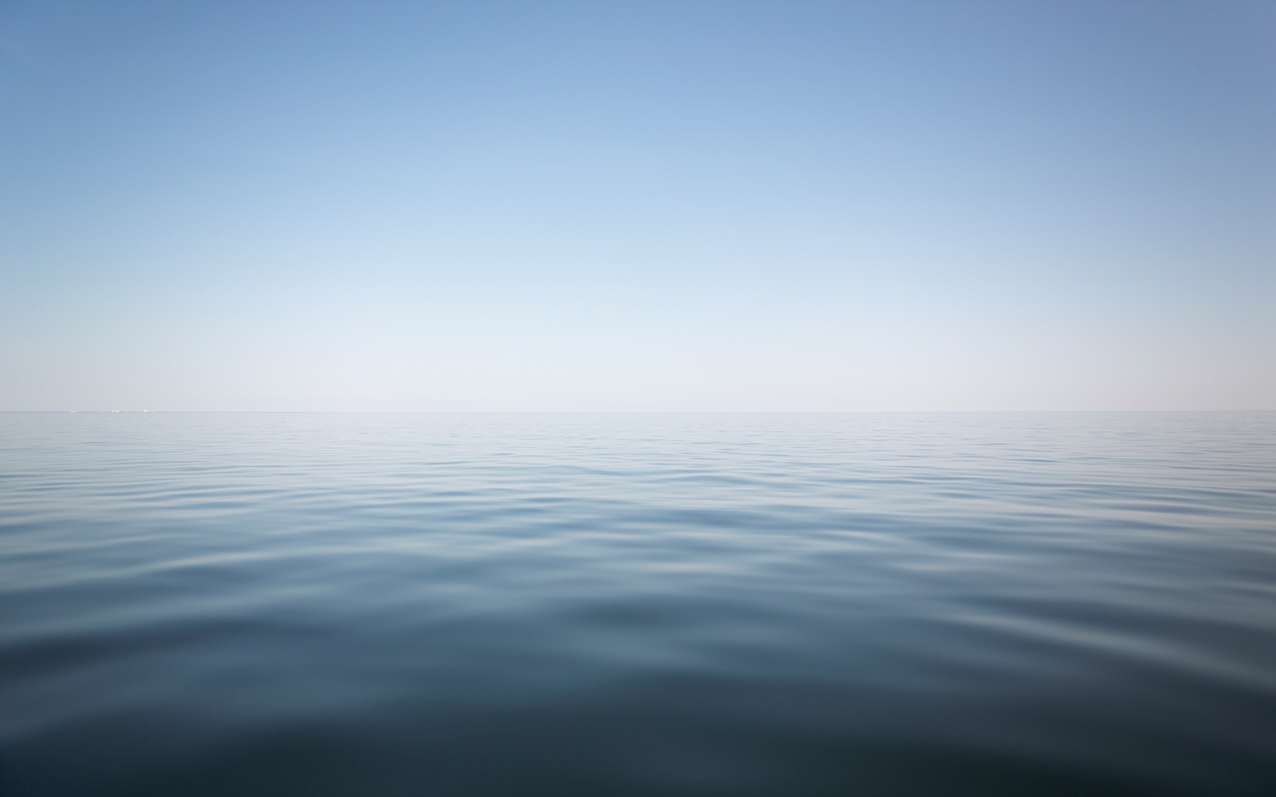 Minimalist seascape with calm water and clear sky HD Wallpaper