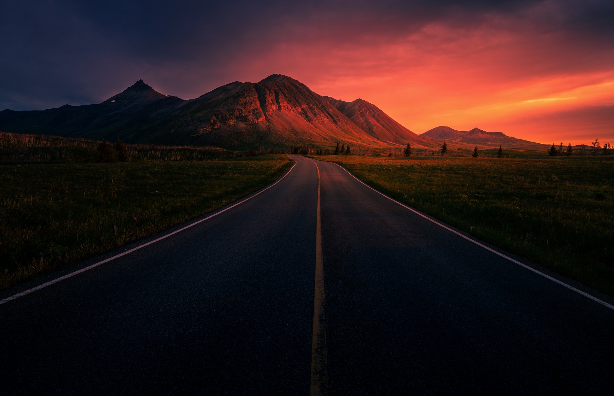 Road leading to mountains at sunset HD Wallpaper