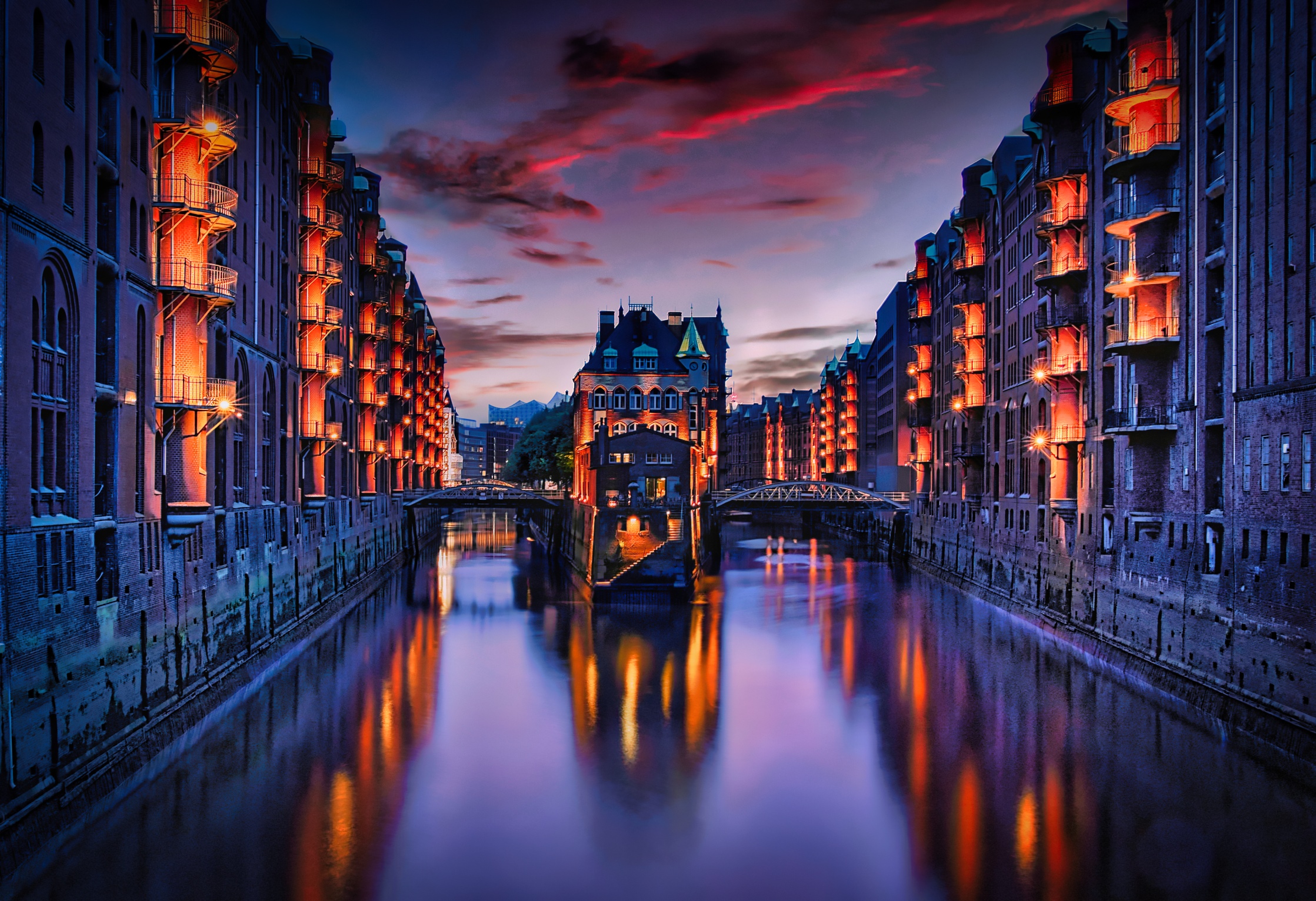 Speicherstadt Hamburg at night with canal reflections HD Wallpaper