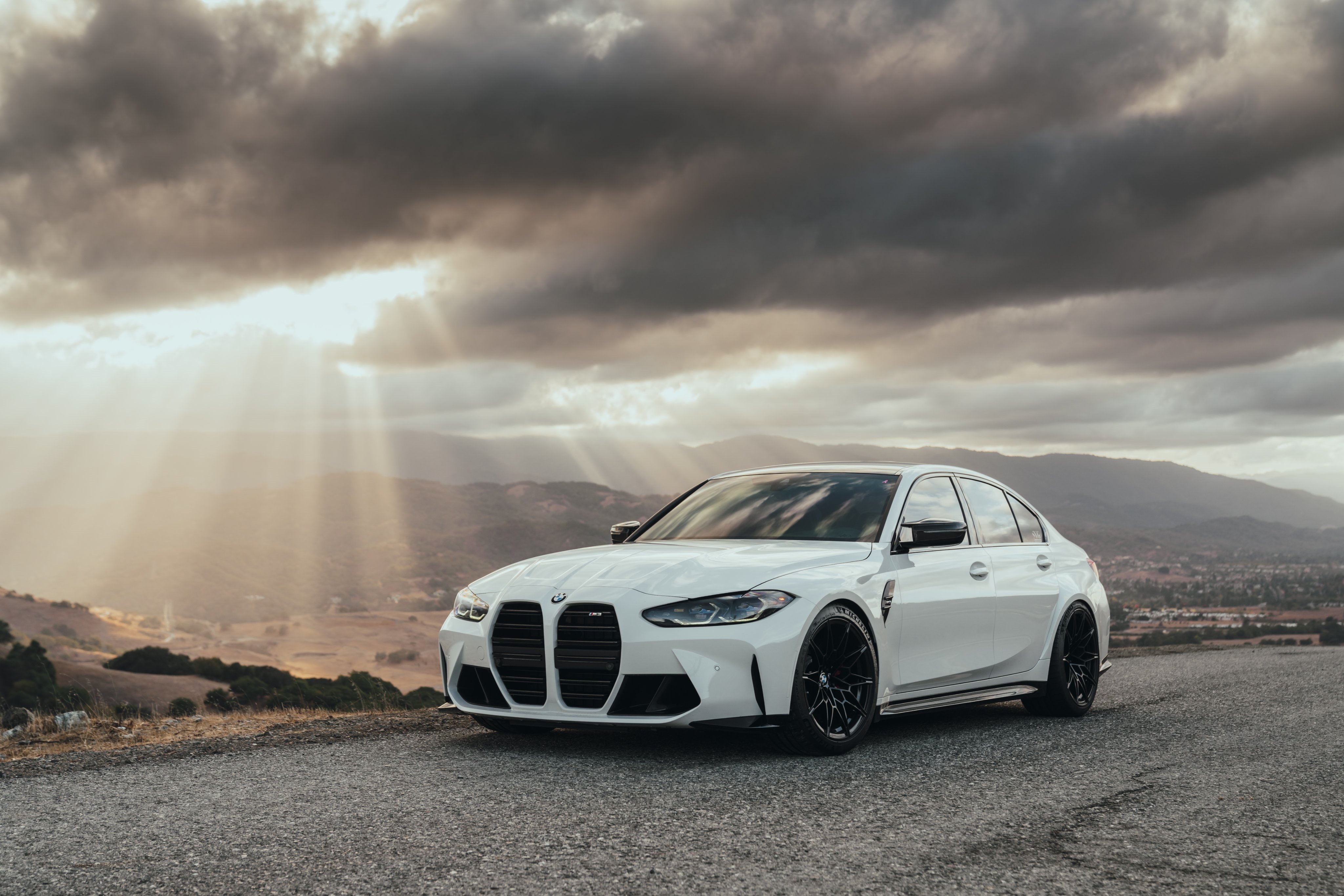 4K white BMW M3 G80 on asphalt road HD Wallpaper