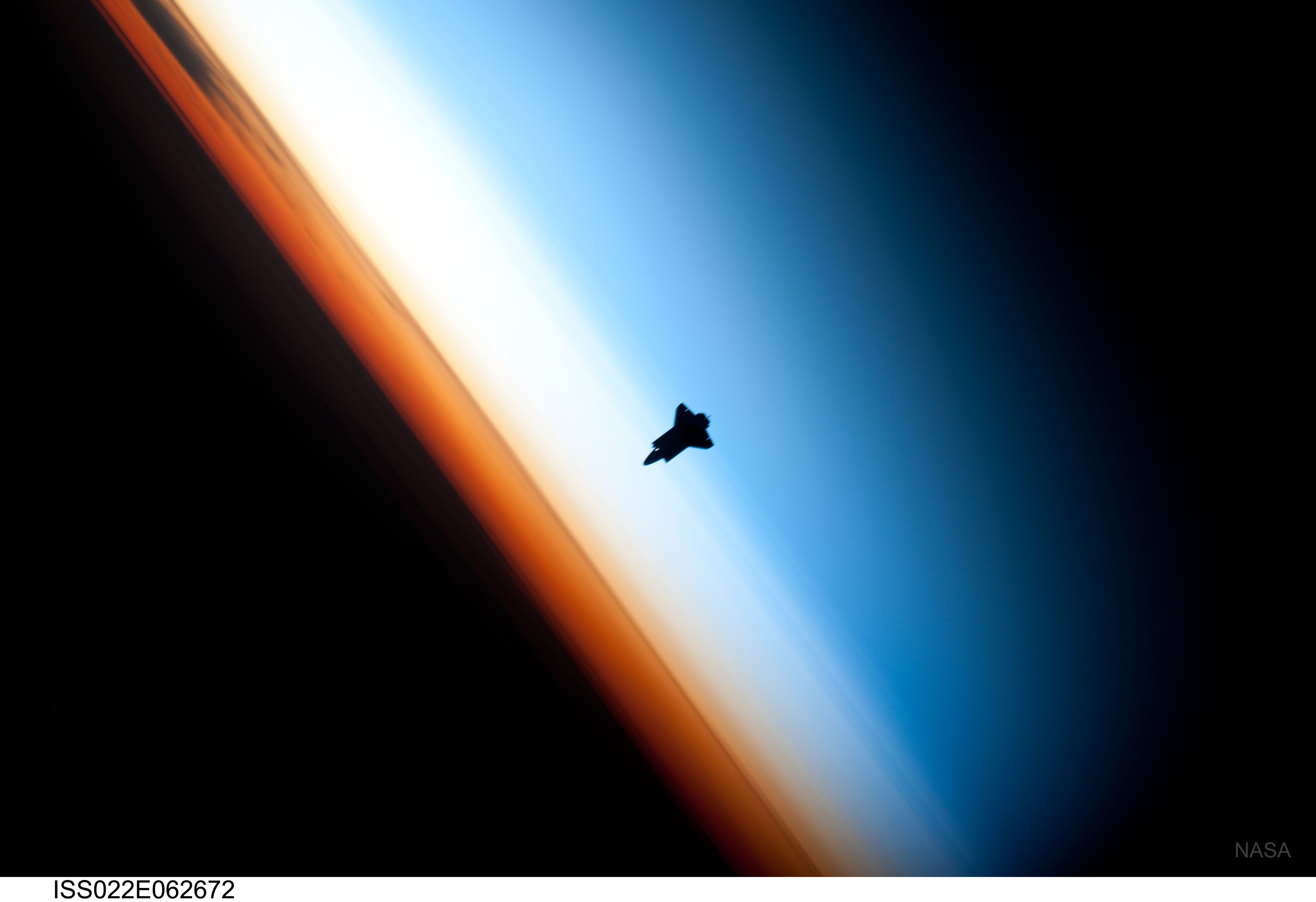 Space Shuttle Orbital View with Earth's Atmosphere HD Wallpaper