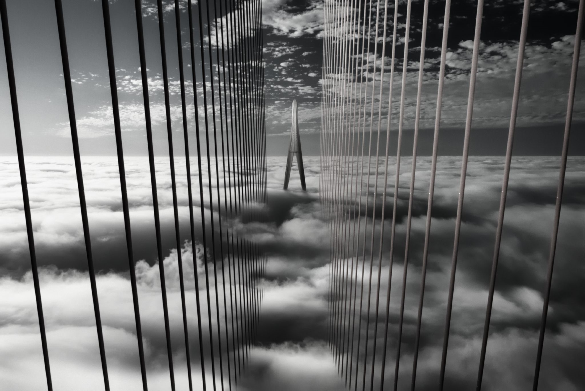 Monochrome suspension bridge above clouds HD Wallpaper