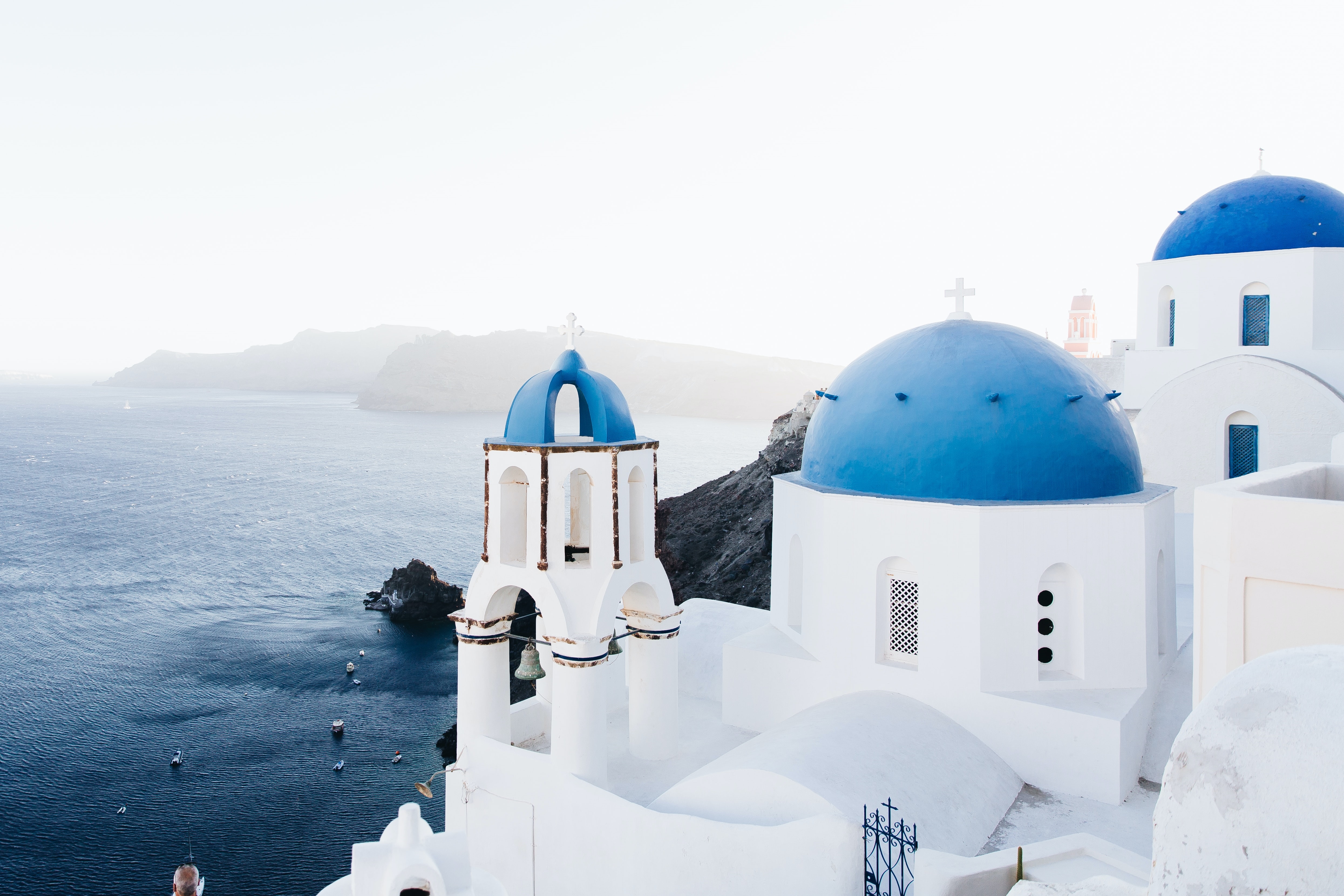 Santorini Greece white buildings with blue domes by the sea HD Wallpaper