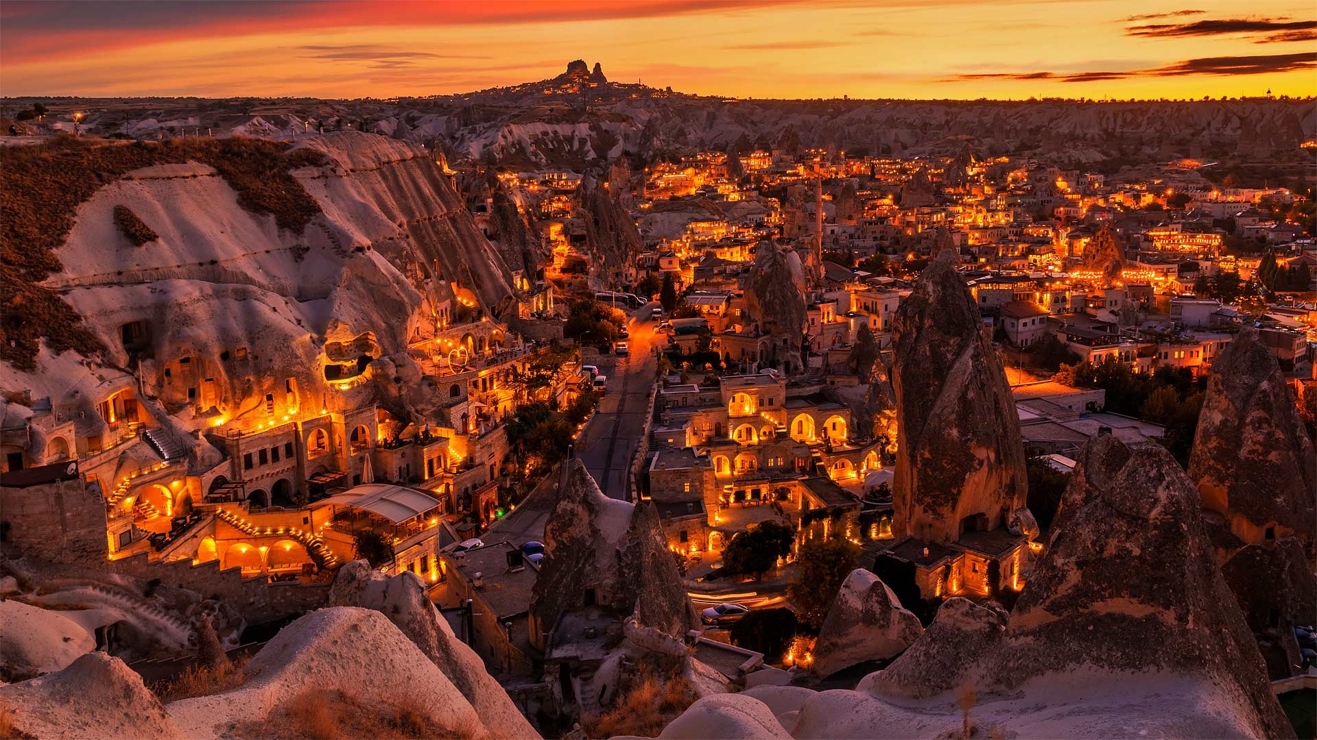 Cappadocia at sunset with fairy chimneys and cave dwellings HD Wallpaper