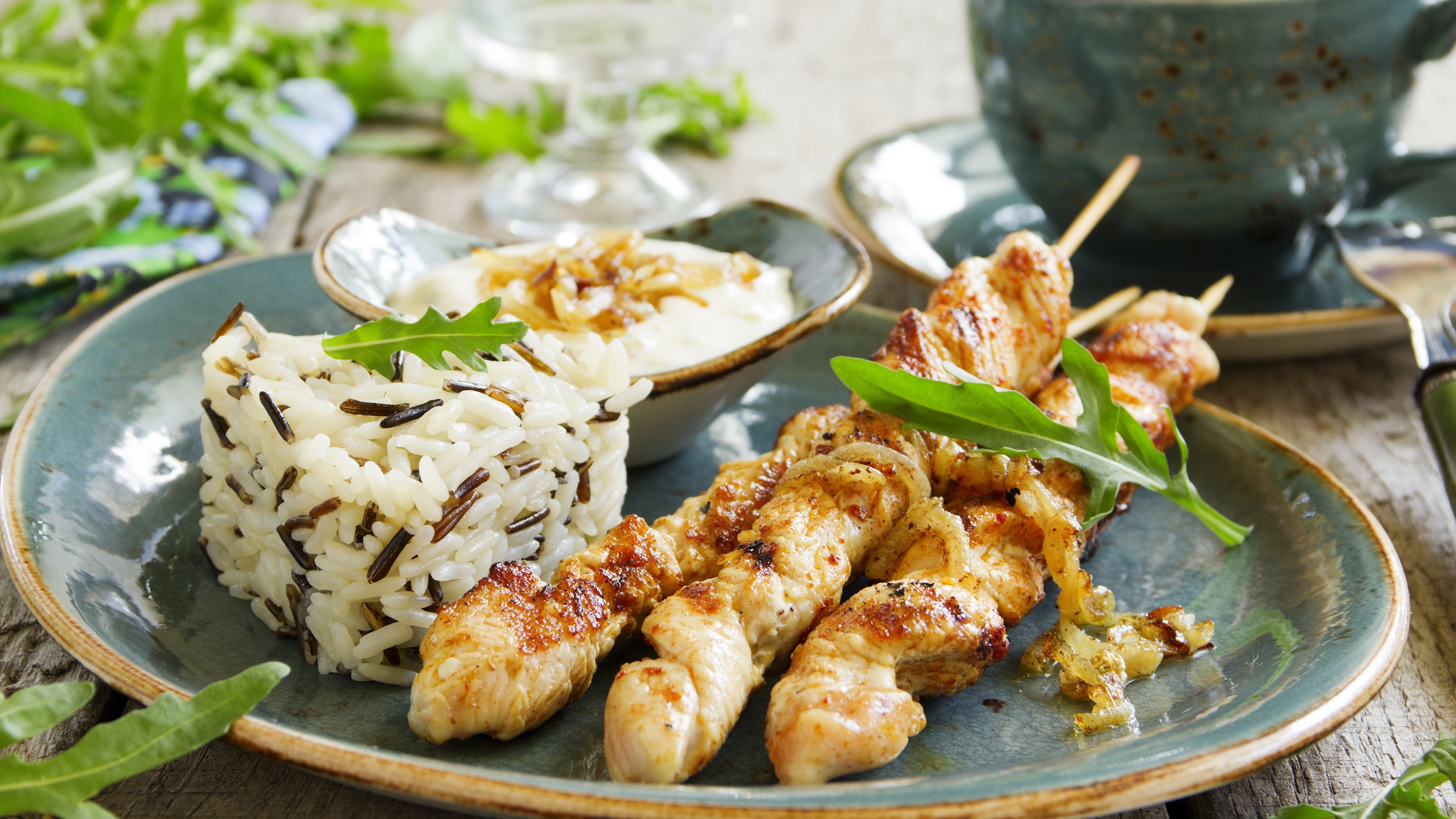 4K food photography of chicken skewers with rice and dip HD Wallpaper
