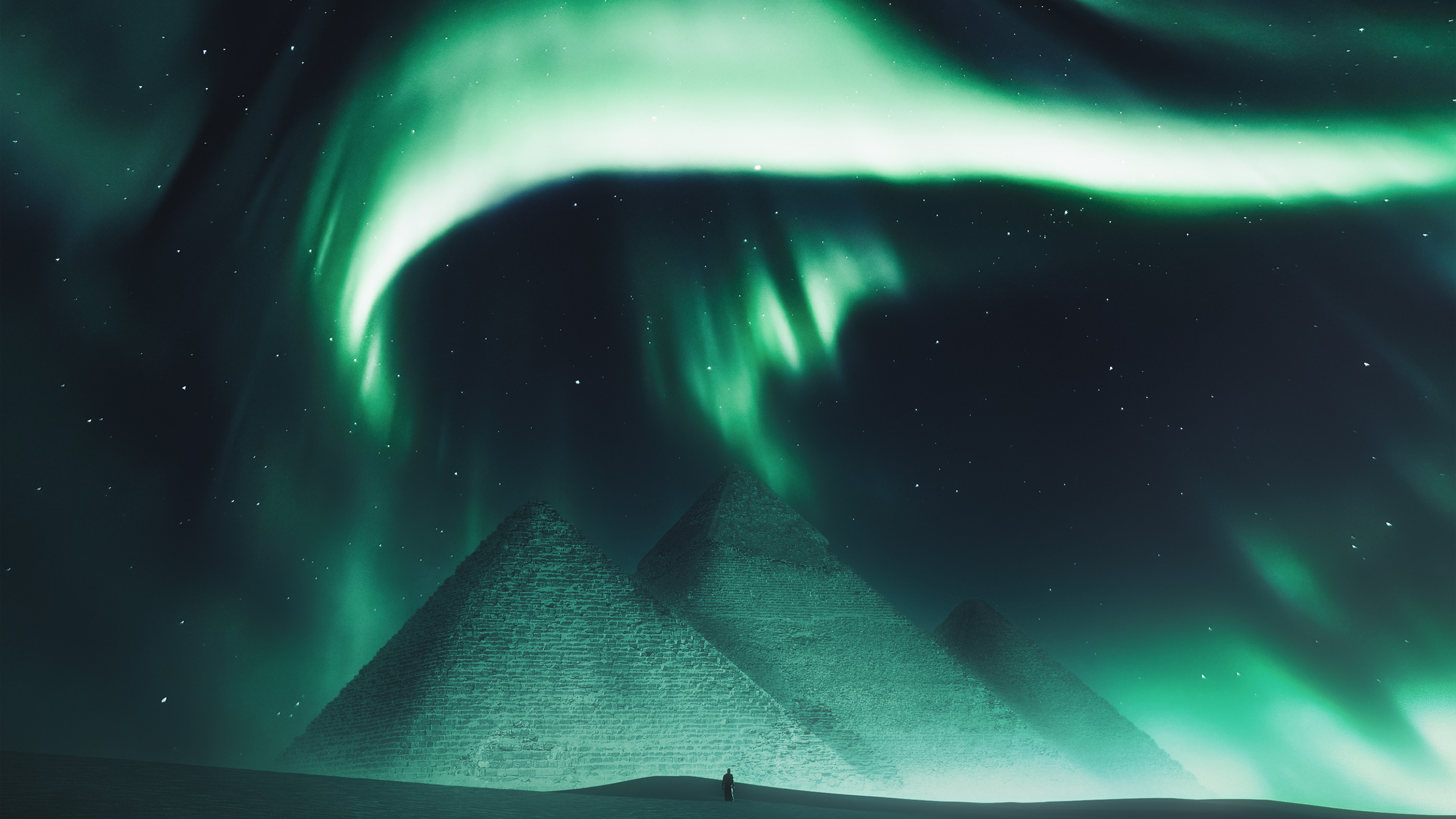 Pyramids under the Aurora Borealis at night HD Wallpaper