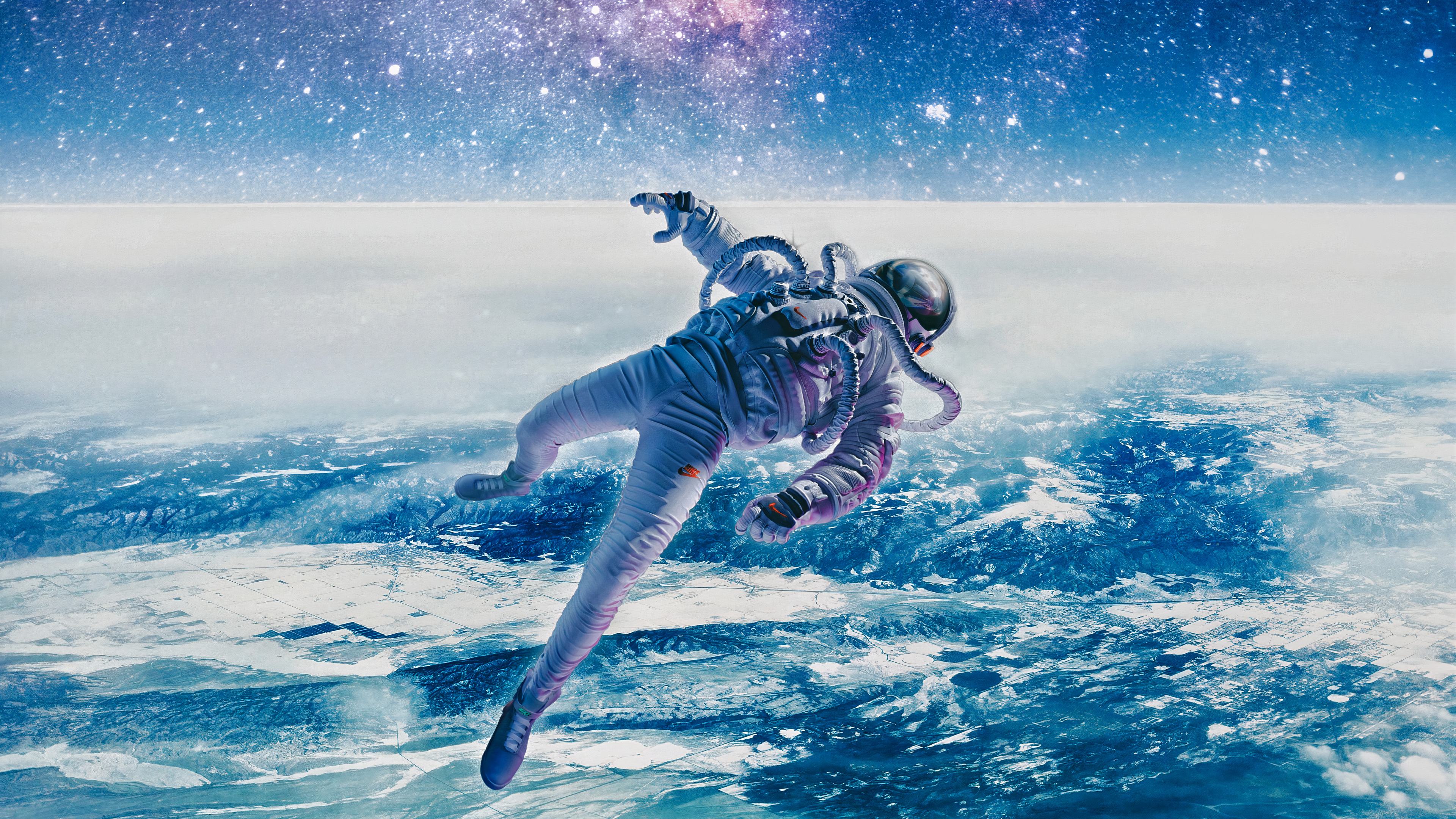 4K Astronaut Floating Above Earth HD Wallpaper