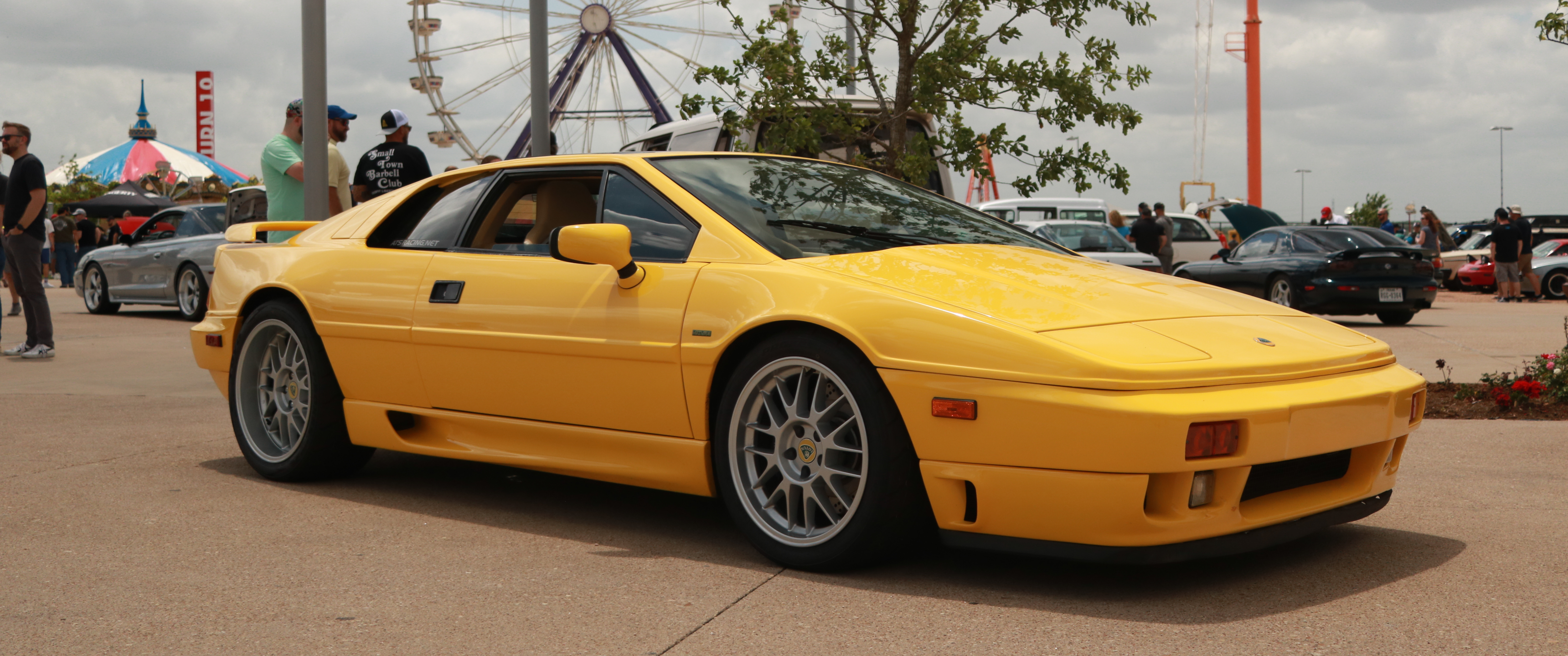 Yellow Lotus Esprit at a car show HD Wallpaper