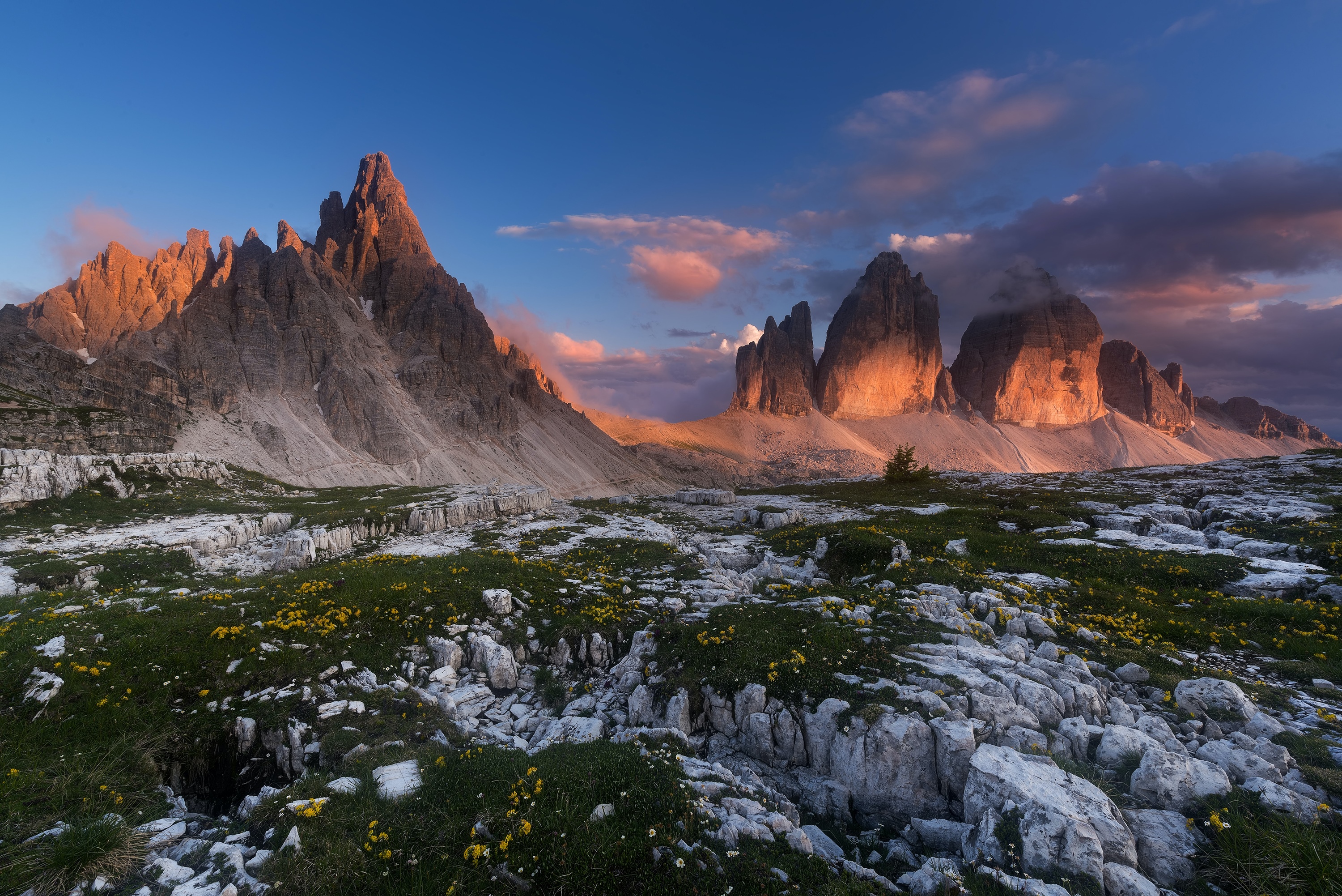 Tre Cime di Lavaredo mountains at sunset HD Wallpaper