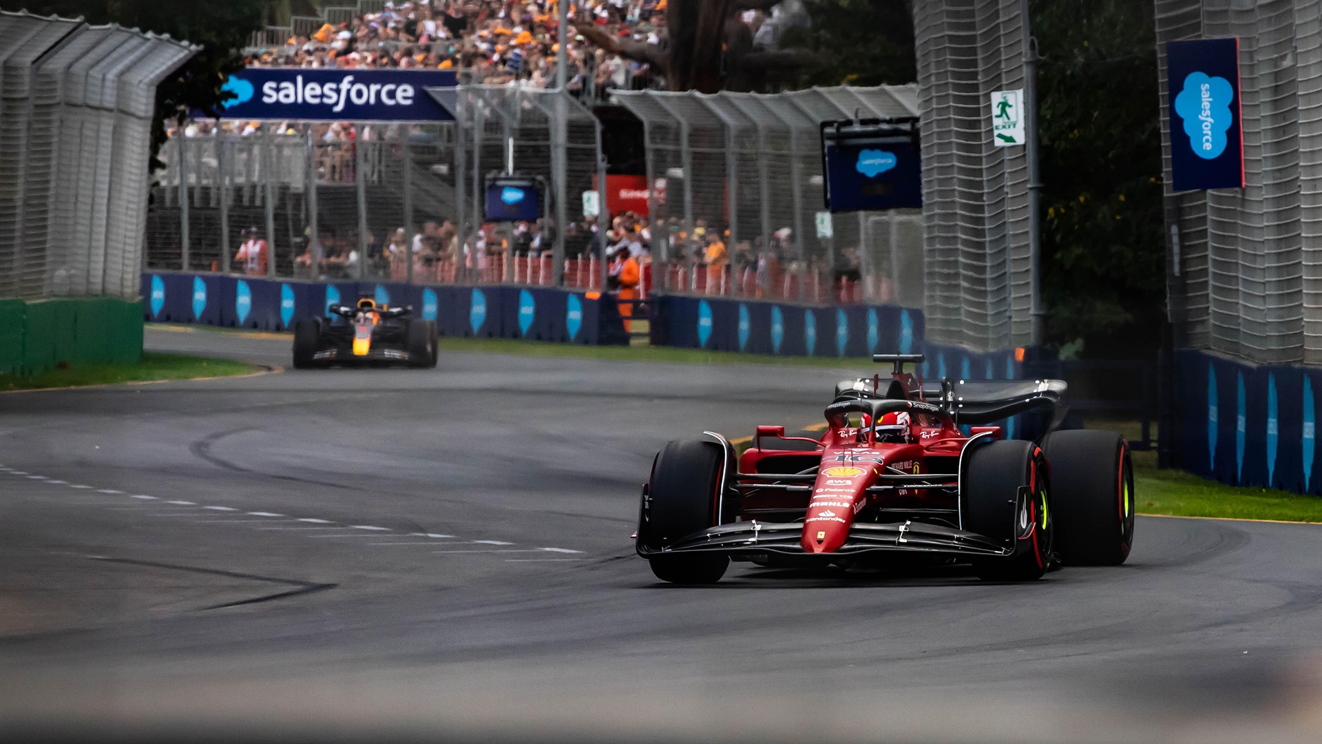 Charles Leclerc driving a Ferrari F1 car HD Wallpaper