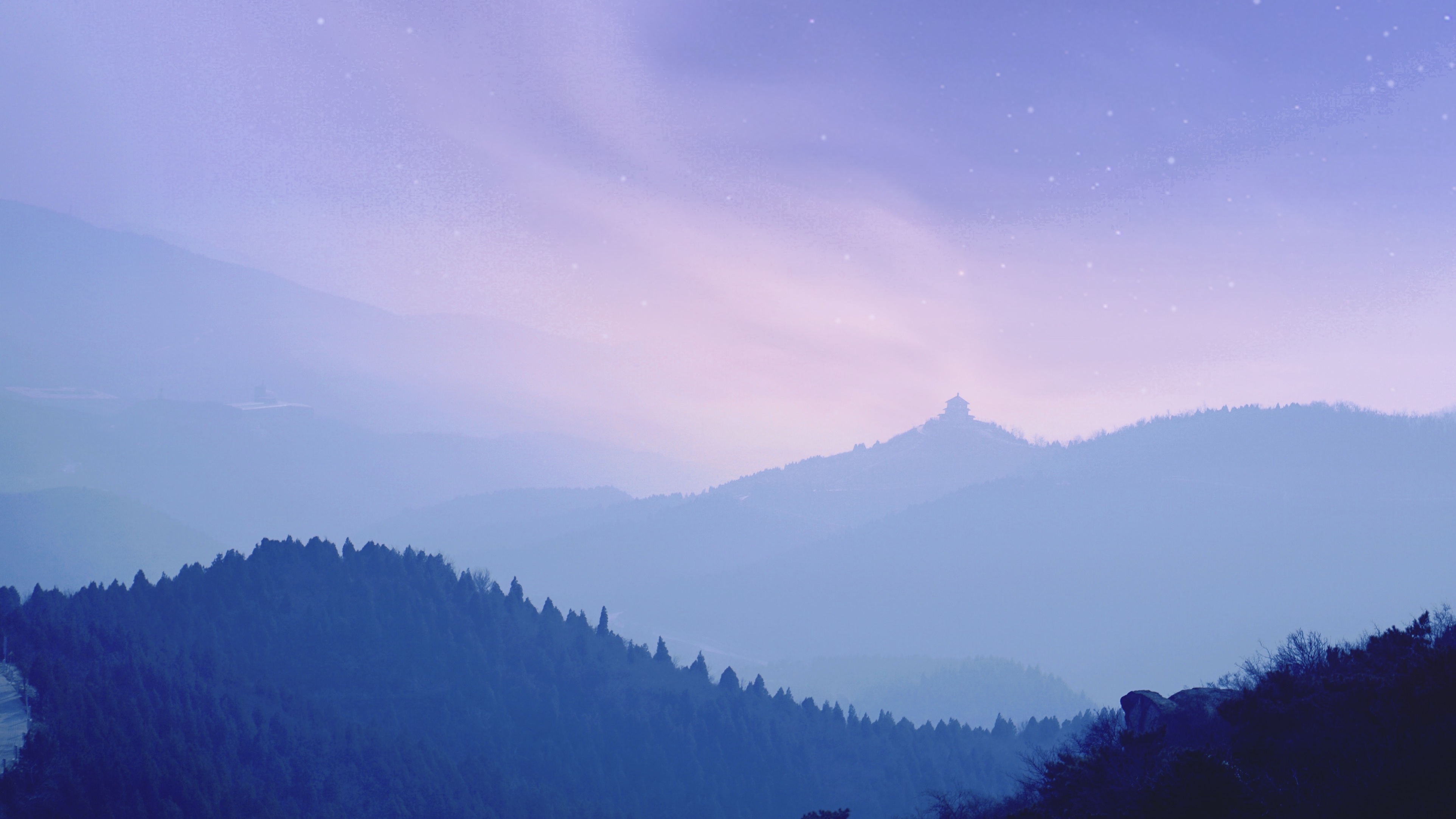 Misty mountains with a building on a peak HD Wallpaper