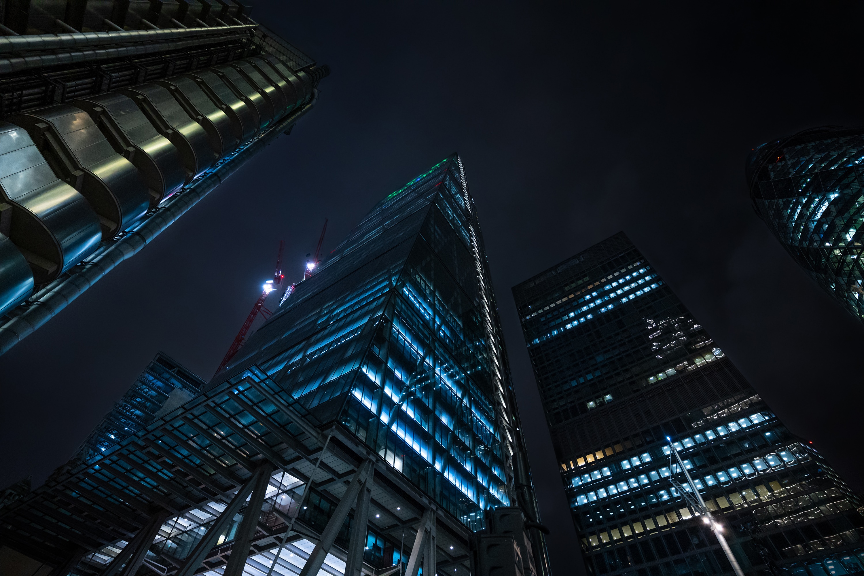 London skyscrapers at night with cranes HD Wallpaper