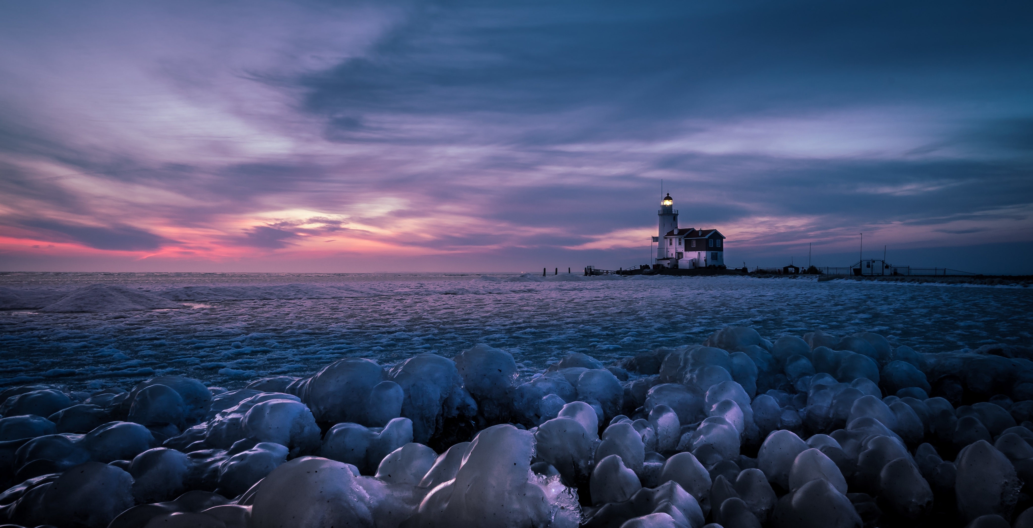 4K Lighthouse in Netherlands at Sunset with Ice HD Wallpaper