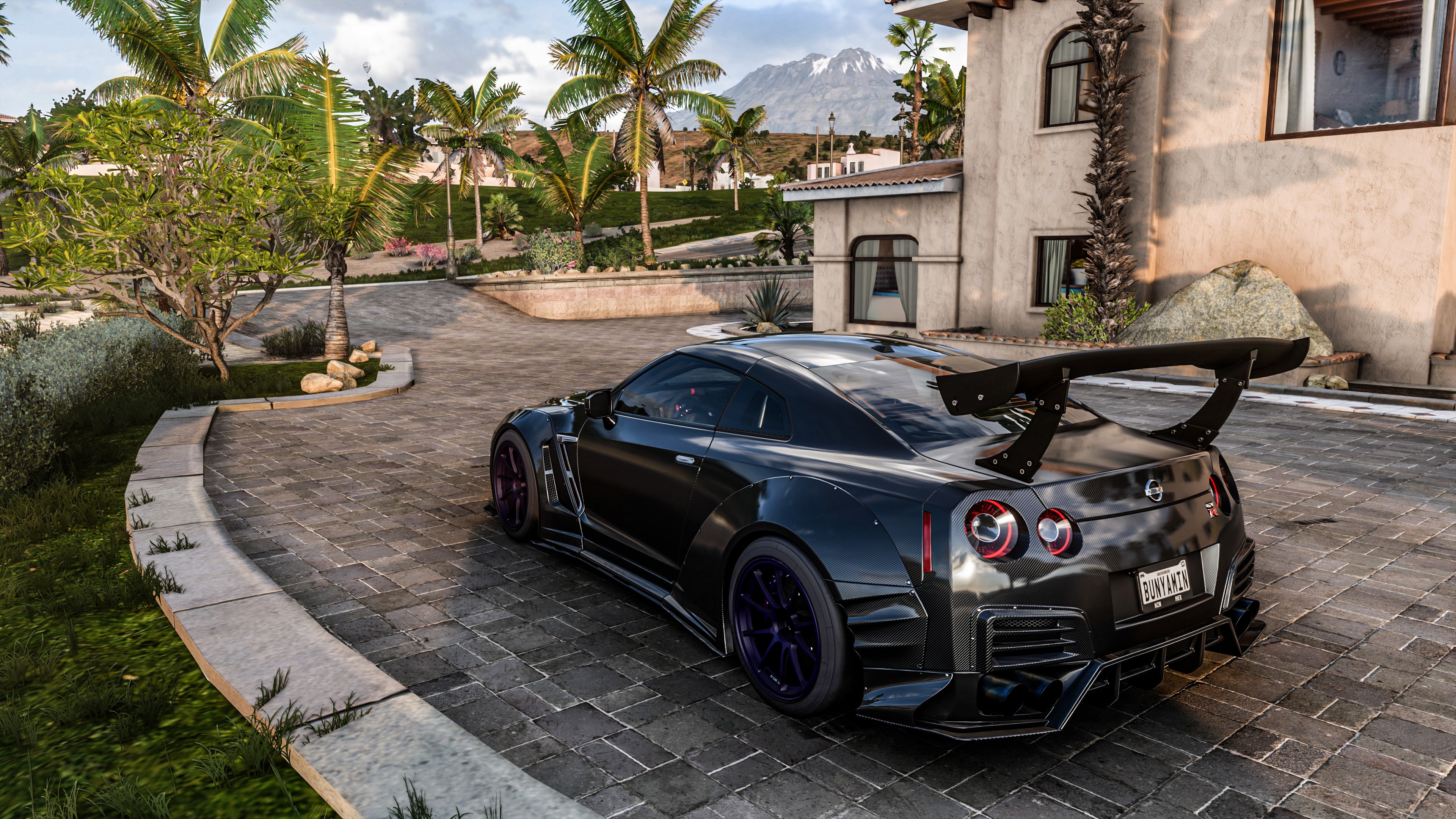4K Nissan GT-R with a large rear spoiler HD Wallpaper