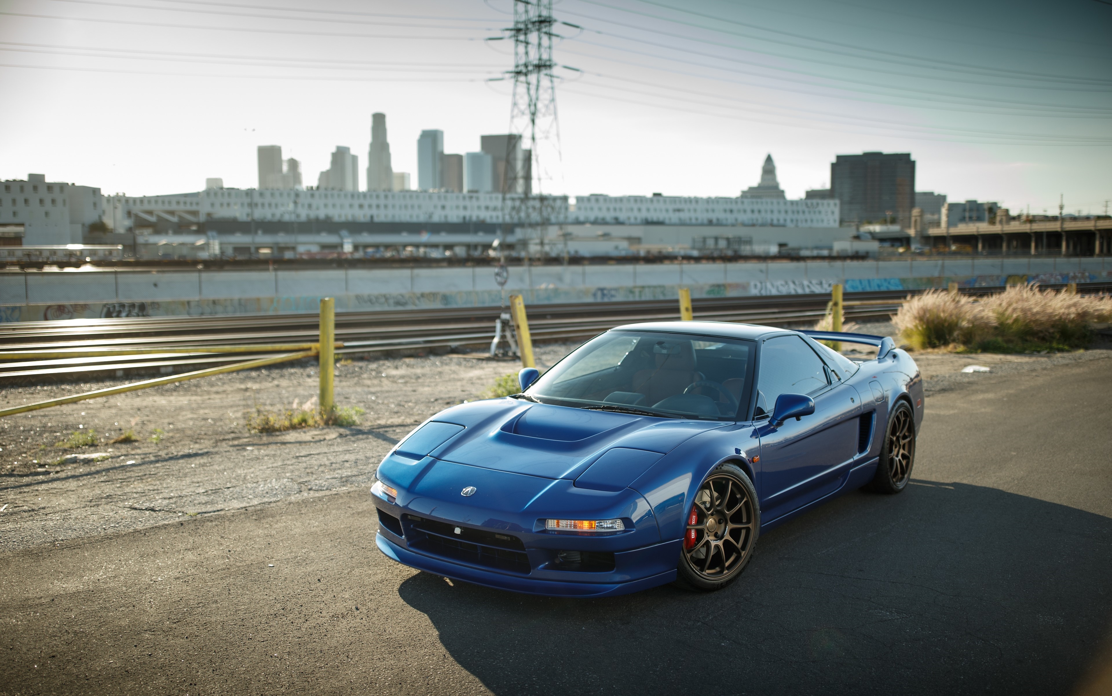 Blue Honda NSX mk1 sports car with city skyline HD Wallpaper