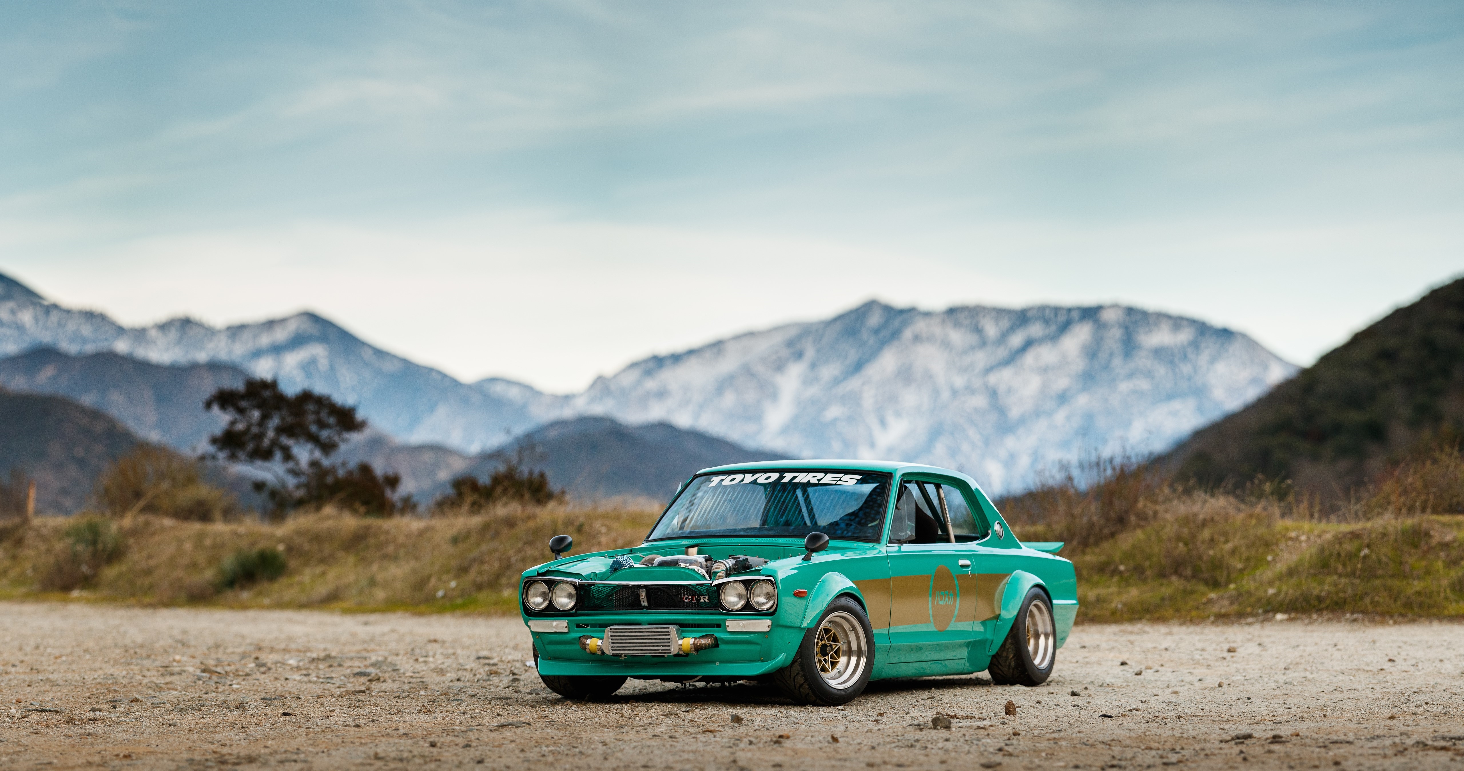 Teal Nissan Skyline C10 with bodykit and Toyo Tires HD Wallpaper
