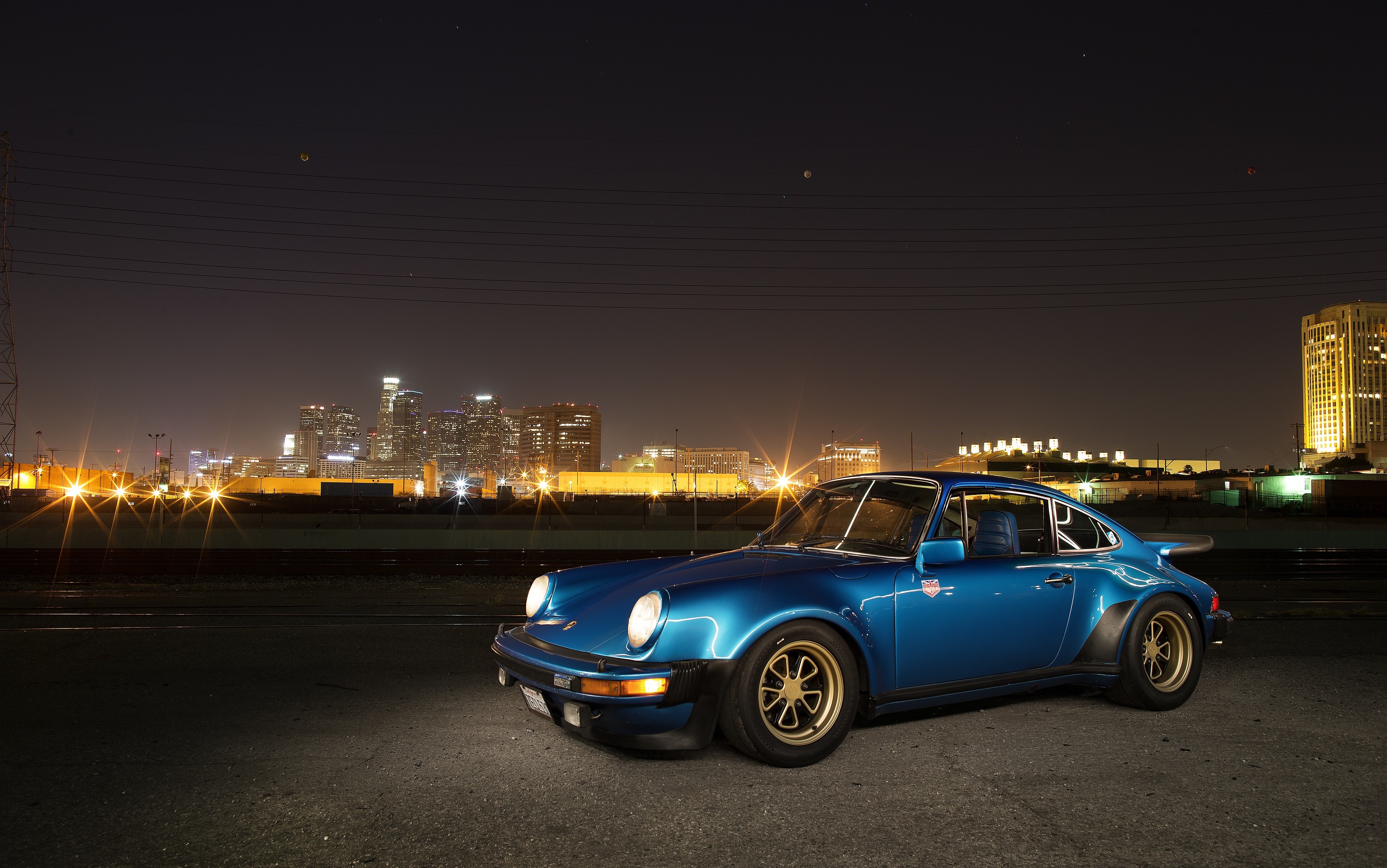 4K Blue Porsche 930 Turbo at Night with City Lights HD Wallpaper