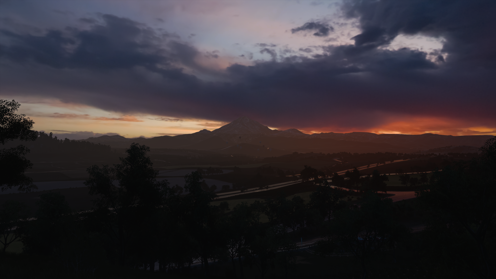 Sunset over mountains and landscape in Forza Horizon 3 HD Wallpaper