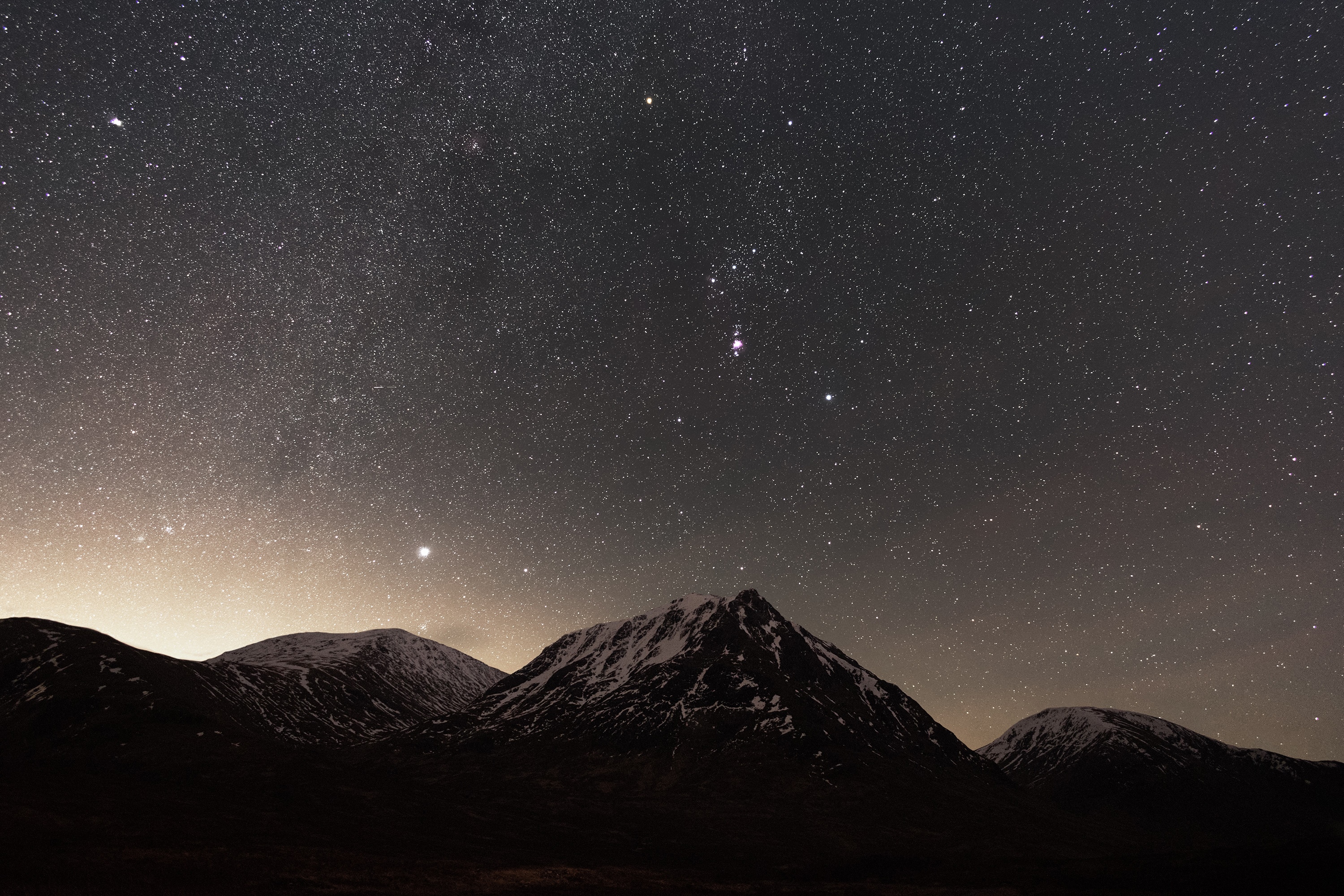 Starry night sky over snow-capped mountains HD Wallpaper