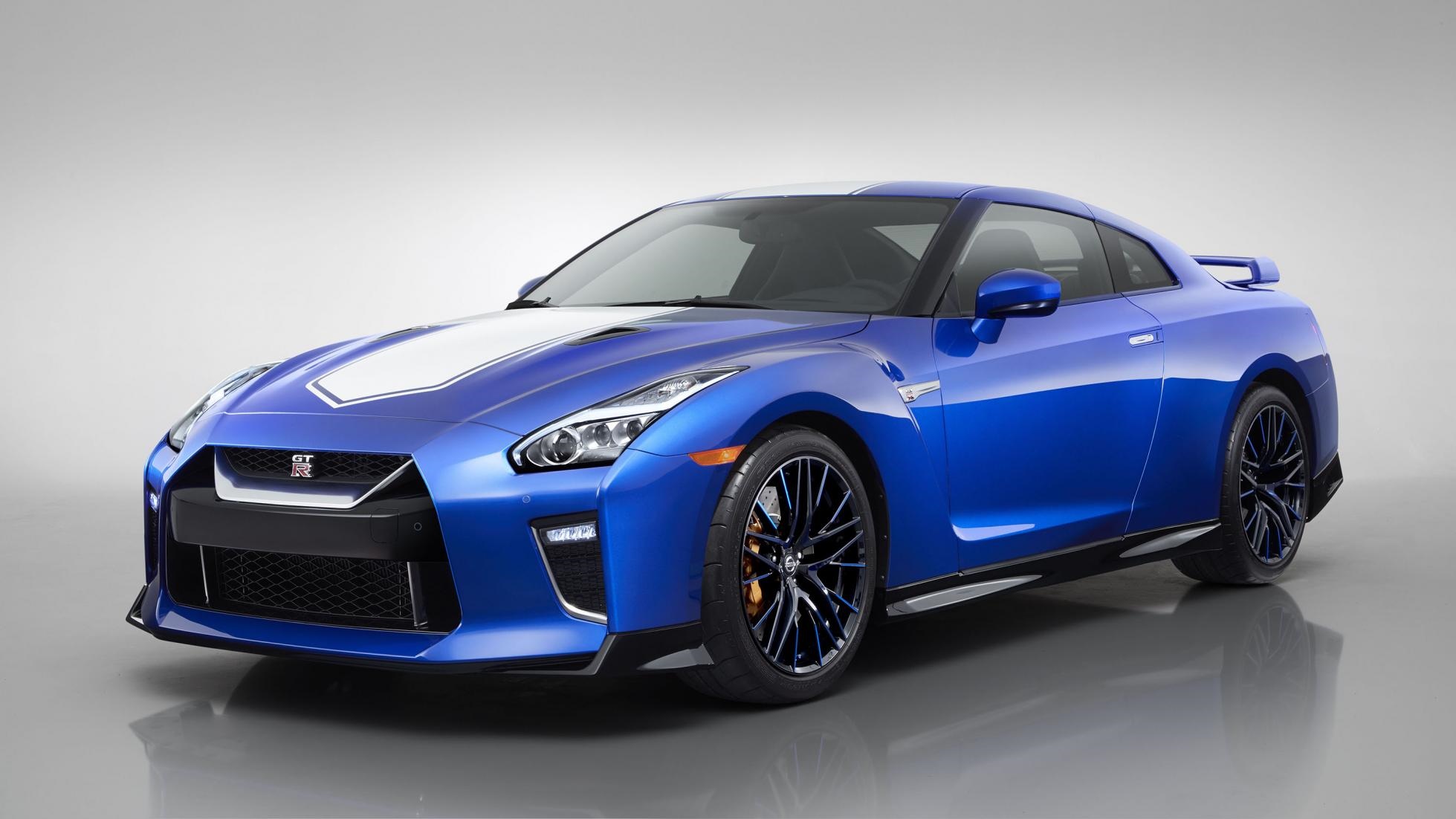 Blue Nissan GT-R sports car with white racing stripes HD Wallpaper