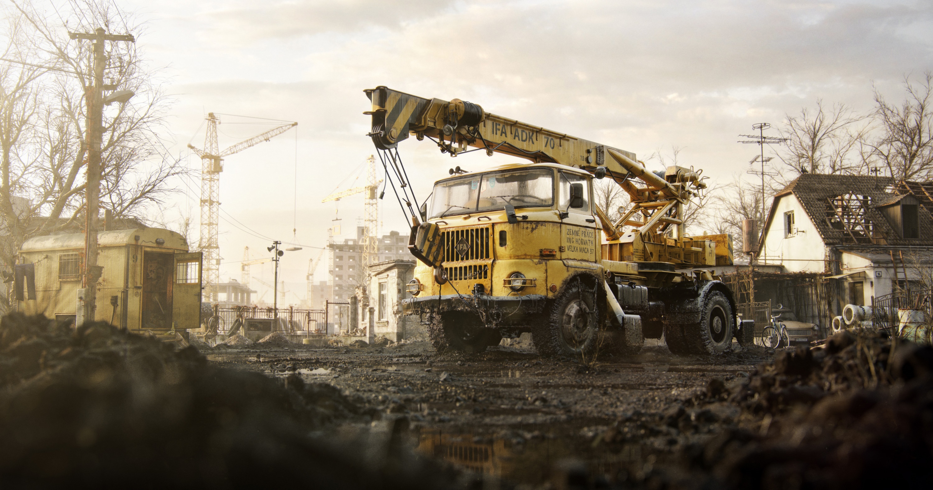Yellow IFA ADR 70 Crane Truck in Muddy Construction Site HD Wallpaper