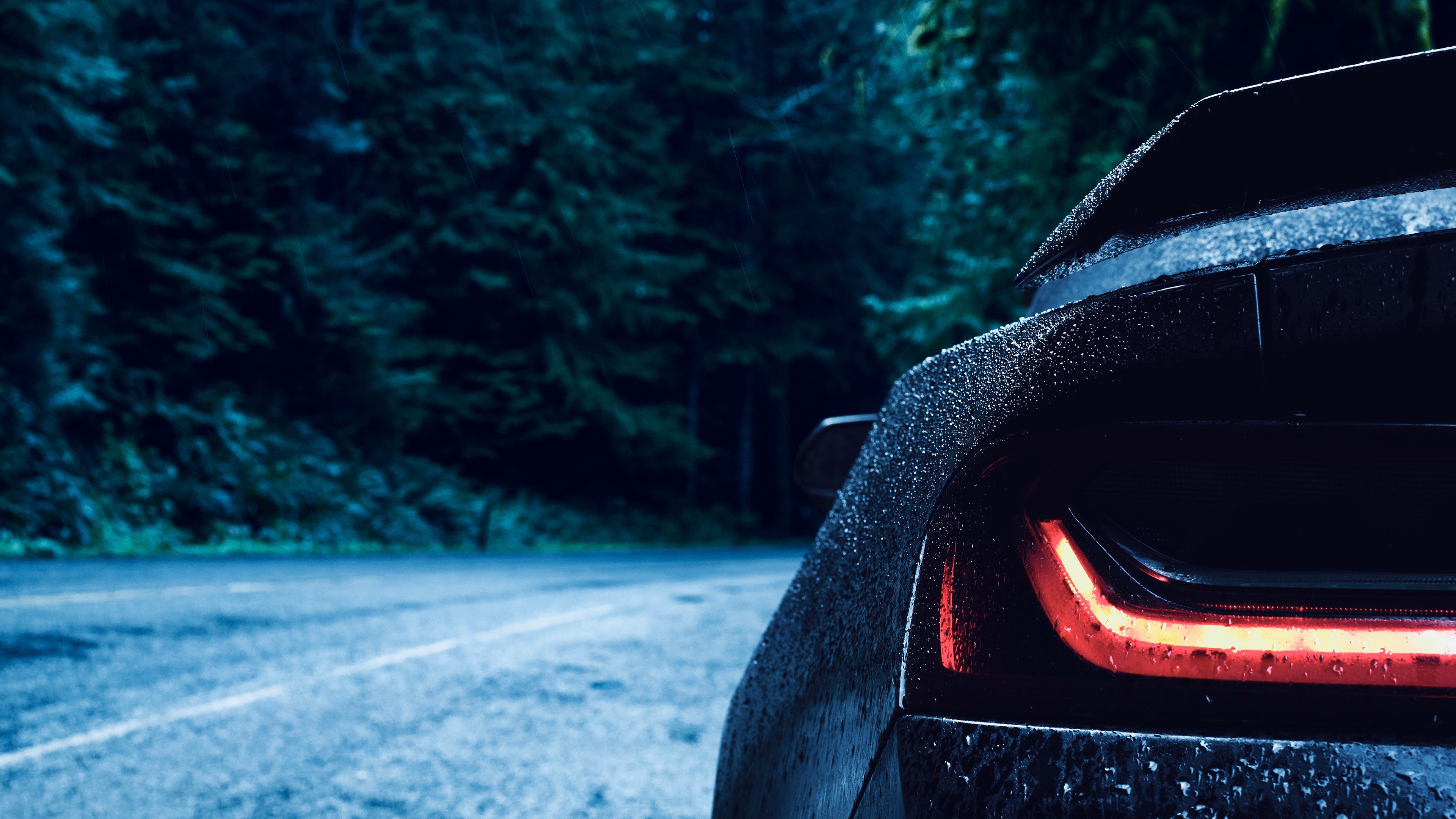 4K black car taillights in the rain HD Wallpaper