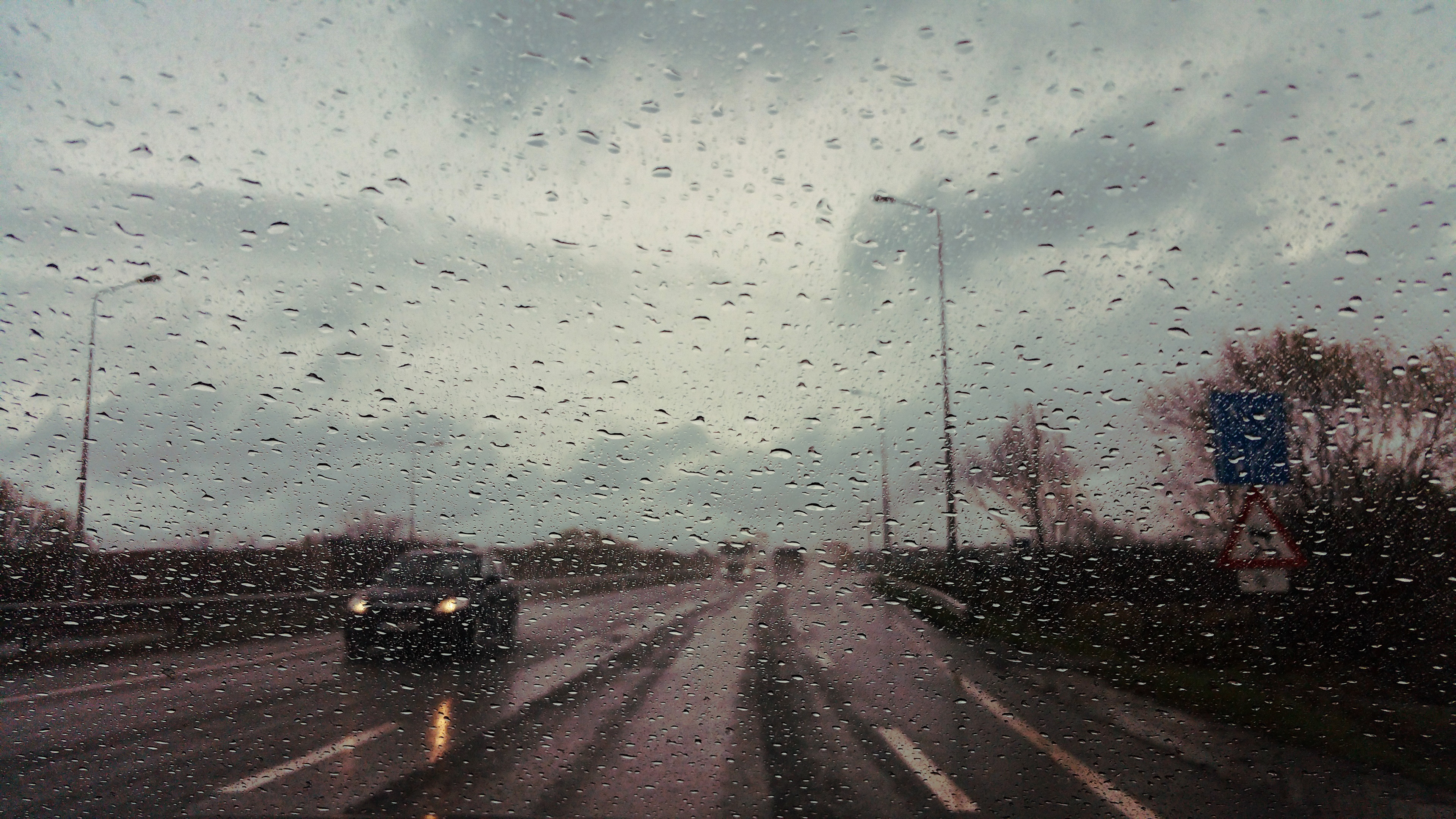4K Rain on Car Windshield POV HD Wallpaper