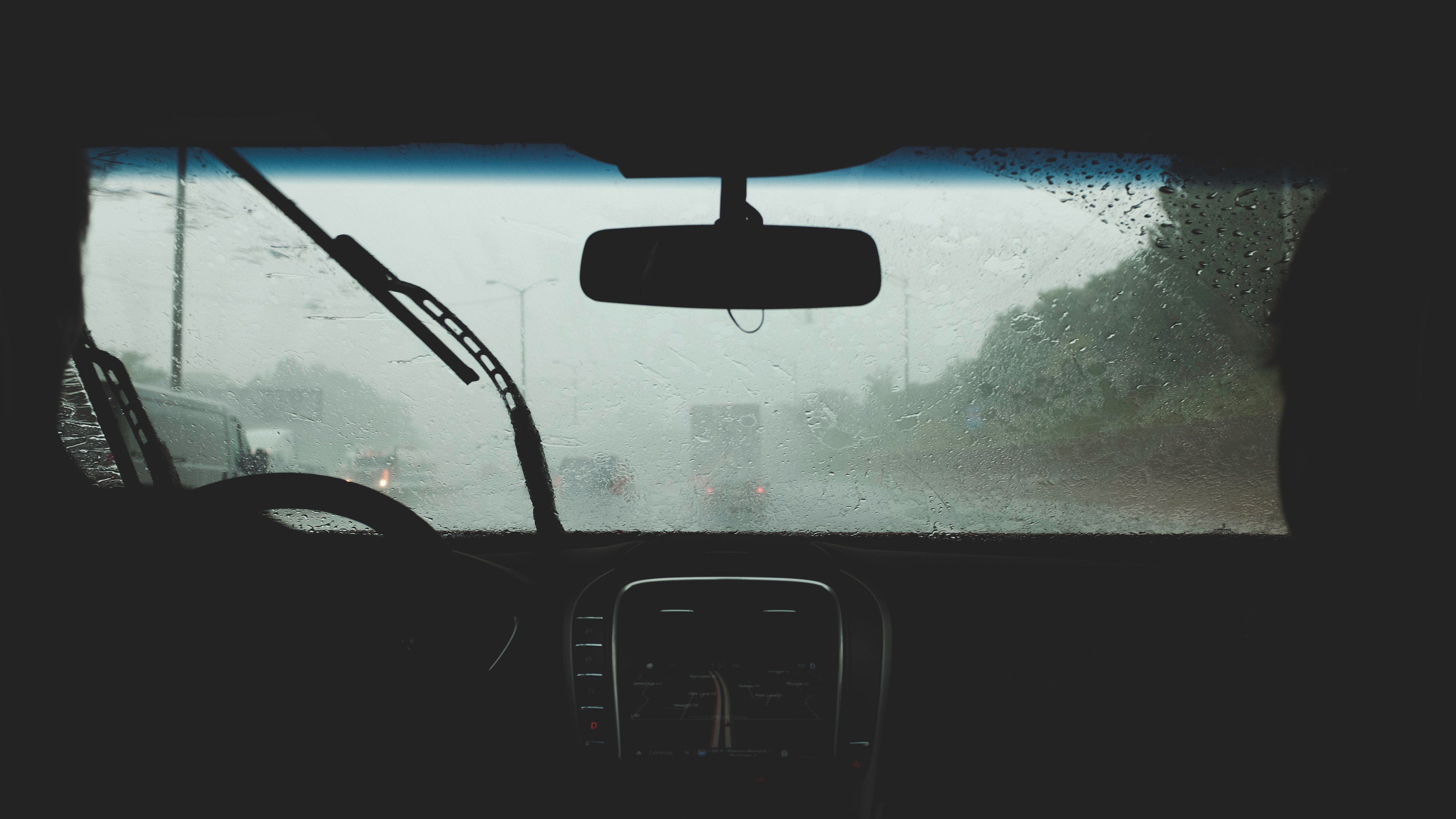 POV looking out car window in rain HD Wallpaper