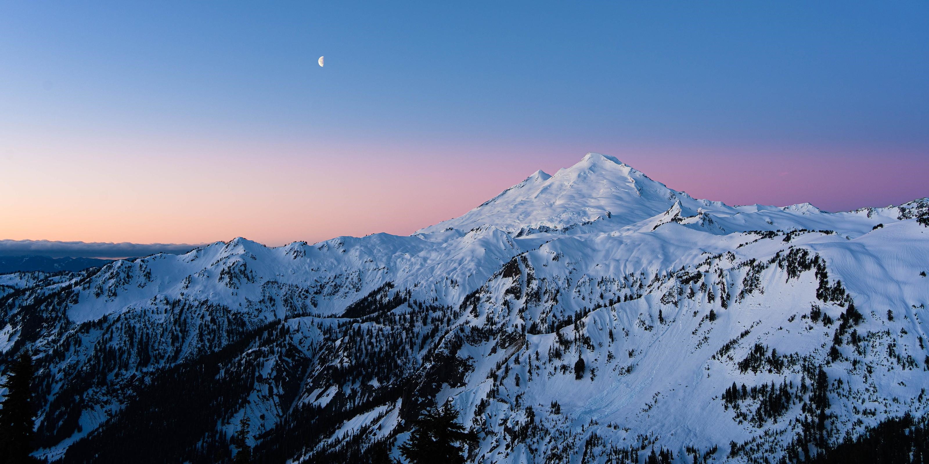 Moon over snow-covered mountains in Washington, USA HD Wallpaper